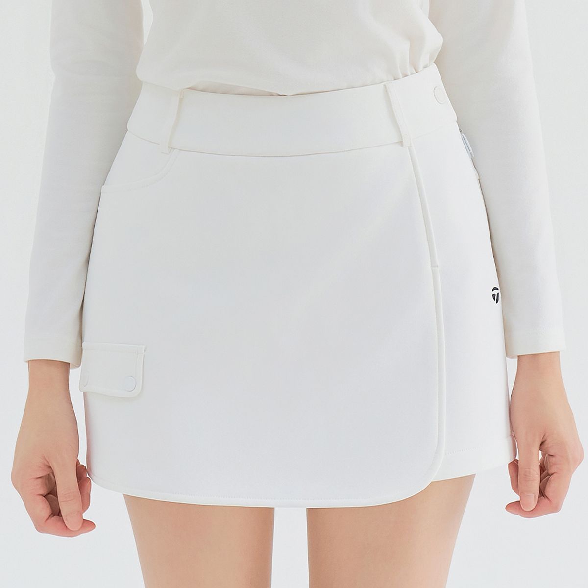 테일러메이드 어패럴(TAYLORMADE APPAREL) 여성 본딩 A라인 랩스커트 반바지 TPN-81HG92-101