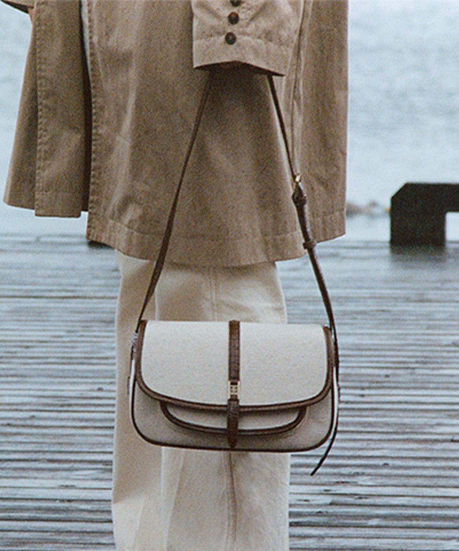 MUSINSA | FOLNUA CLASSIC LOGO MINI POST BAG [BROWN - CANVAS]