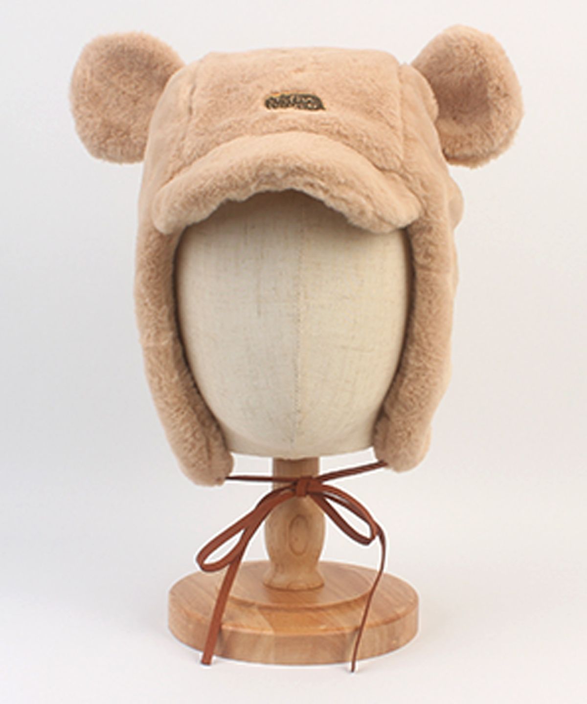 유니버셜 케미스트리(UNIVERSAL CHEMISTRY) Bear Fur Beige Earflap Cap 귀달이모자