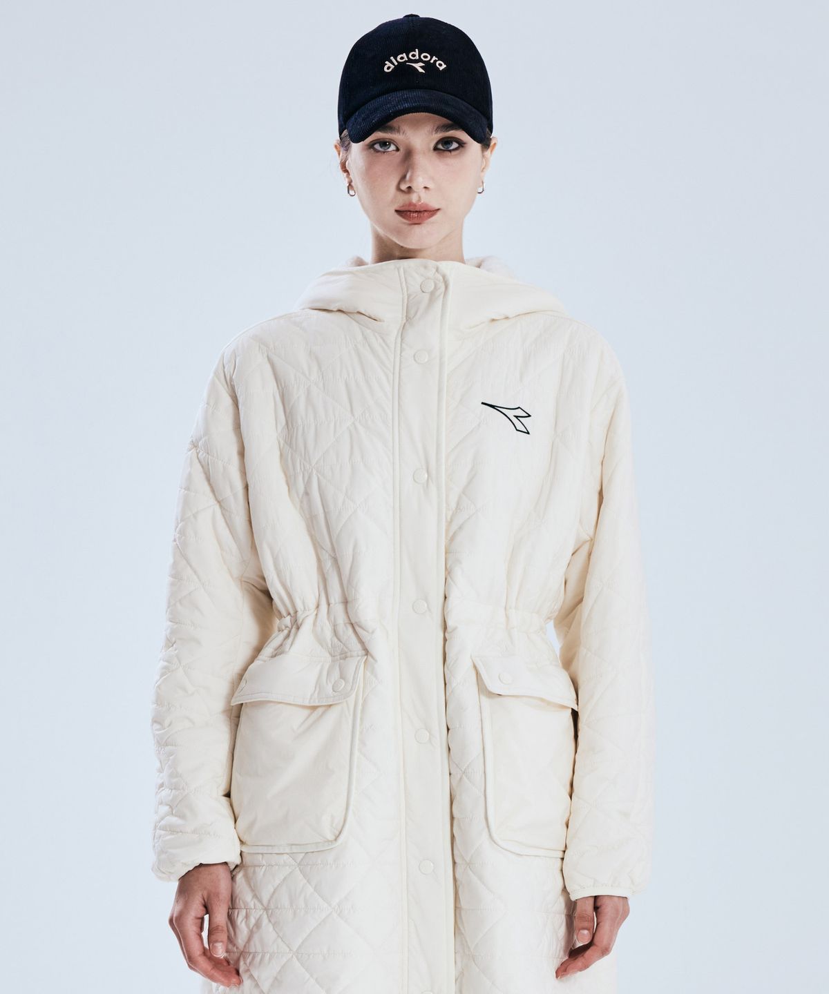 디아도라(diadora) 벤치 플리스 롱패딩 자켓 IVORY