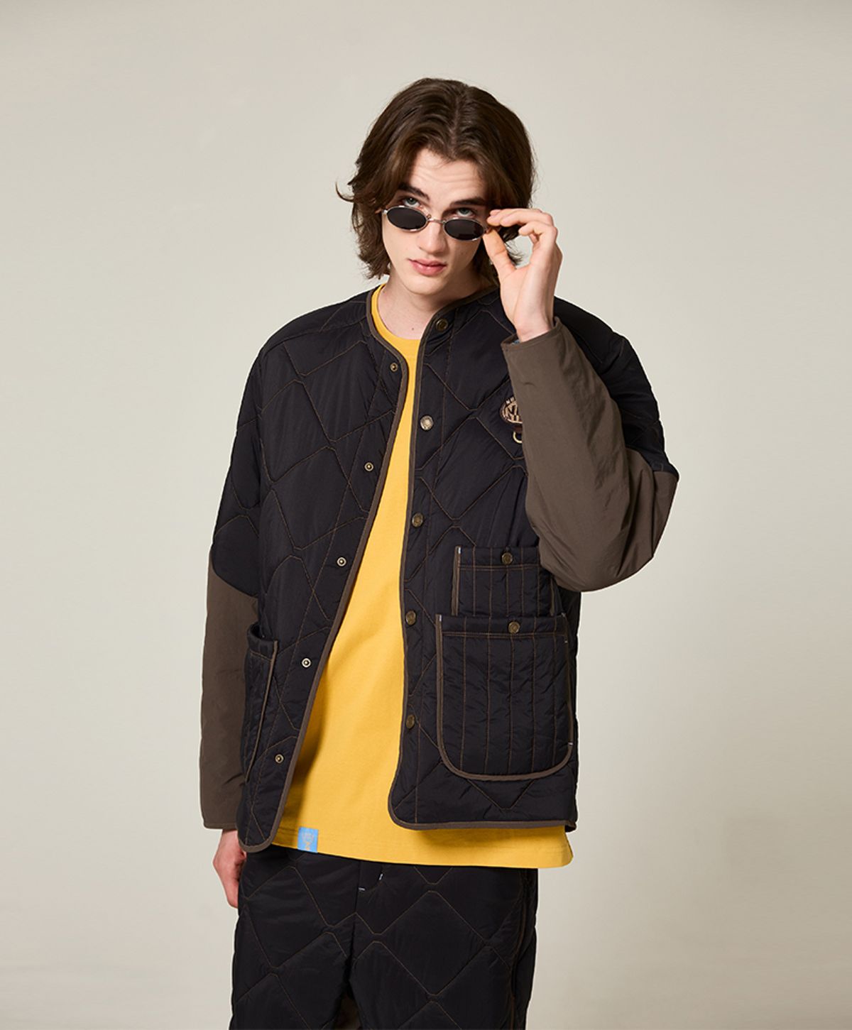 누크피터(NUUKFITTER) AERO LOGO PATCHED PADDING JUMPER [BLACK]