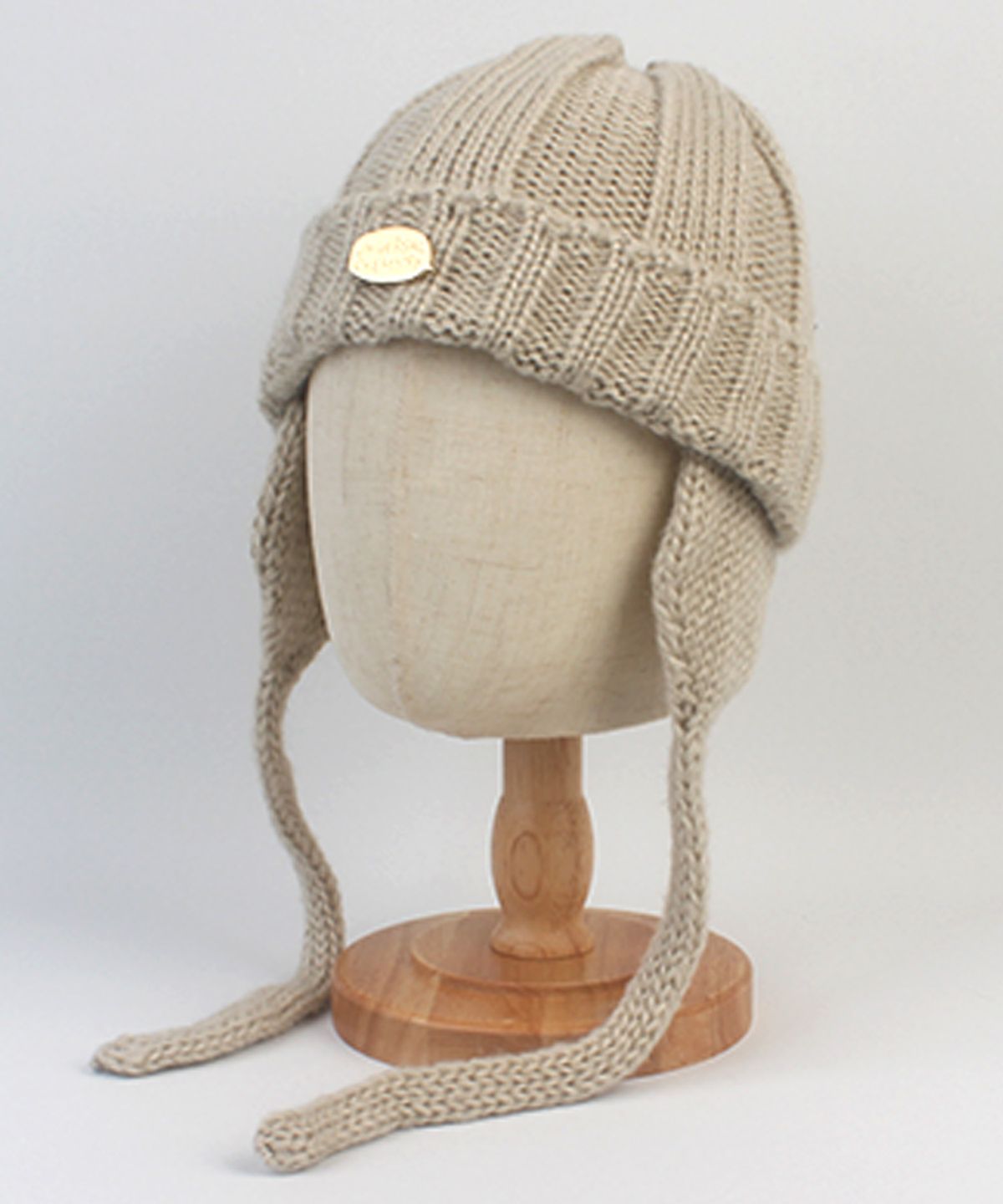 유니버셜 케미스트리(UNIVERSAL CHEMISTRY) Bubble Beige Earflap Beanie 귀달이비니