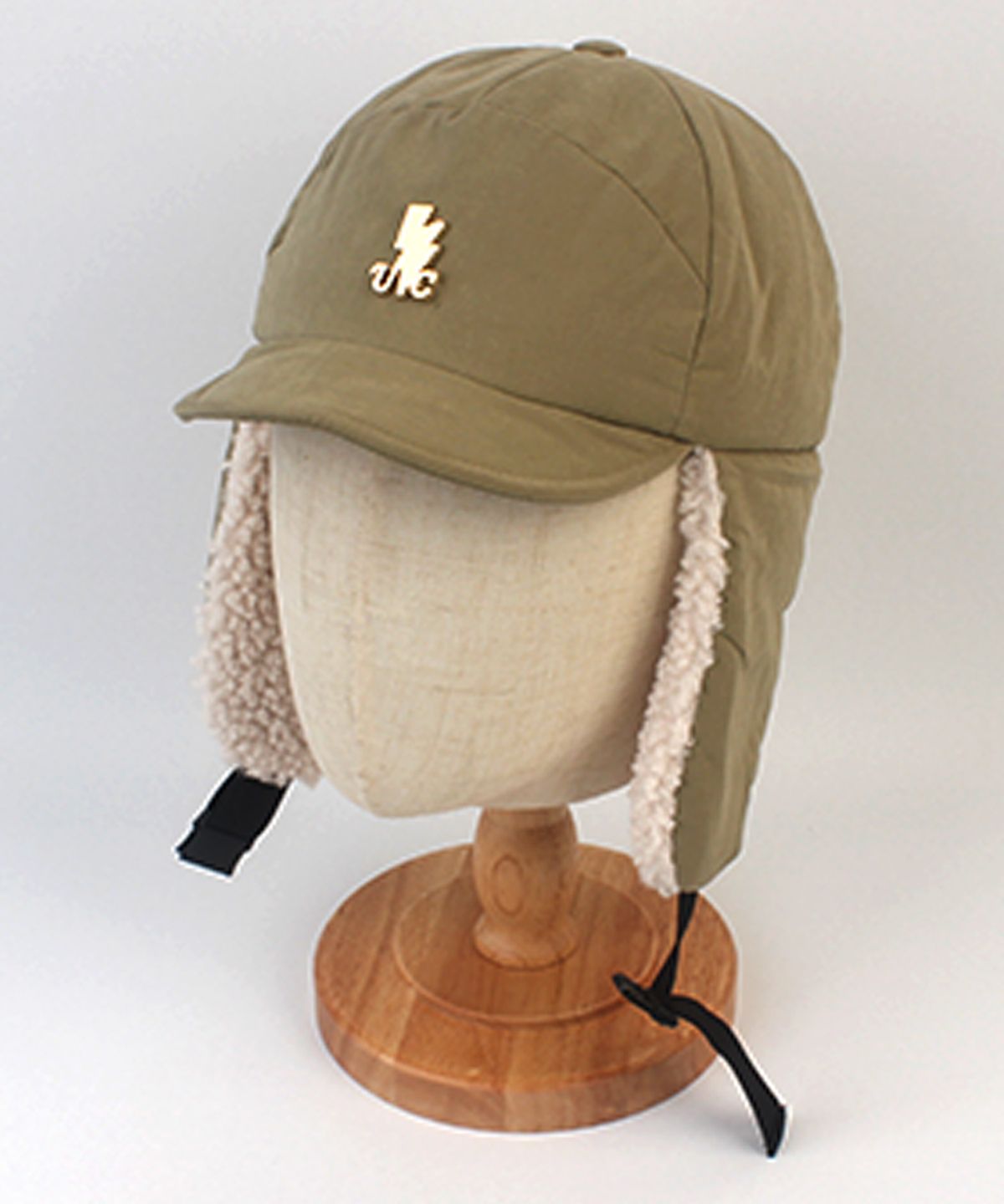 유니버셜 케미스트리(UNIVERSAL CHEMISTRY) Wire Poly Beige Earflap Cap 귀달이모자