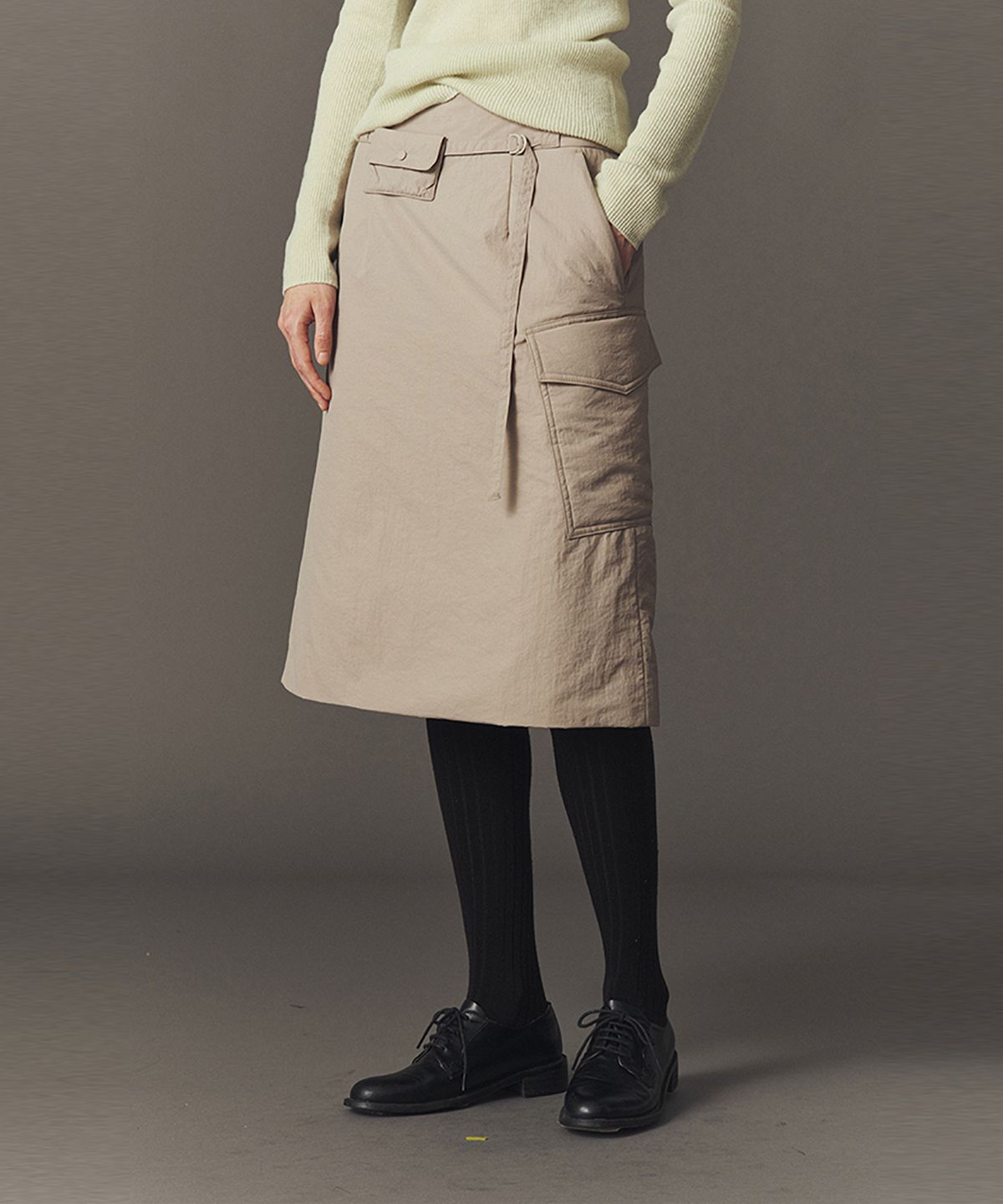 아위(AHWE) SOFT PUFFER SKIRT_P BEIGE