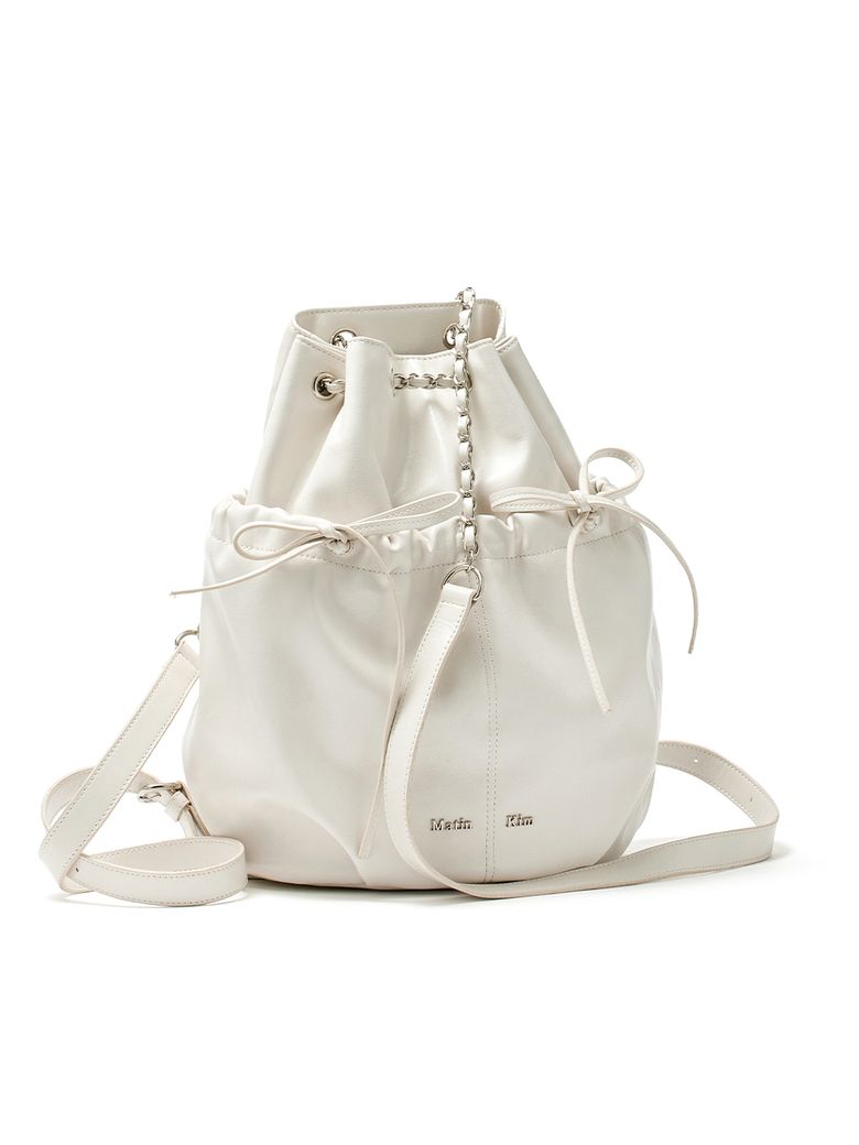 DRAW STRING RIBBON BACK PACK IN IVORY