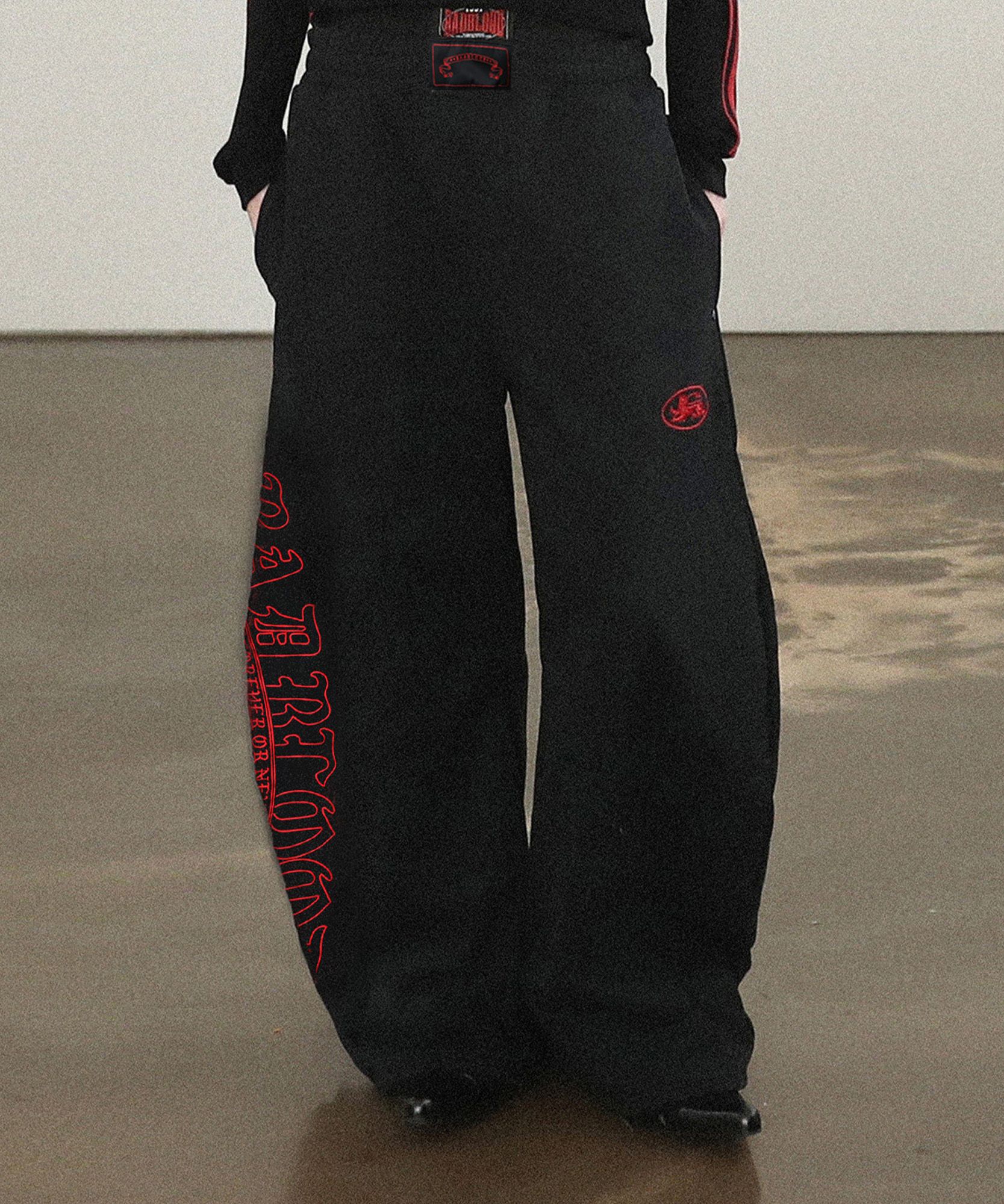 MUSINSA | BADBLOOD Mystic Capsule 2 Way Curved Jogger Trousers - Black