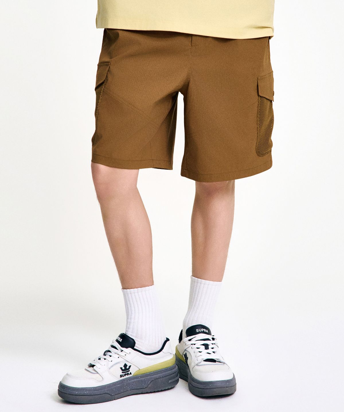 수프라(SUPRA) 라벨 메쉬 포켓 우븐 쇼츠(BROWN)