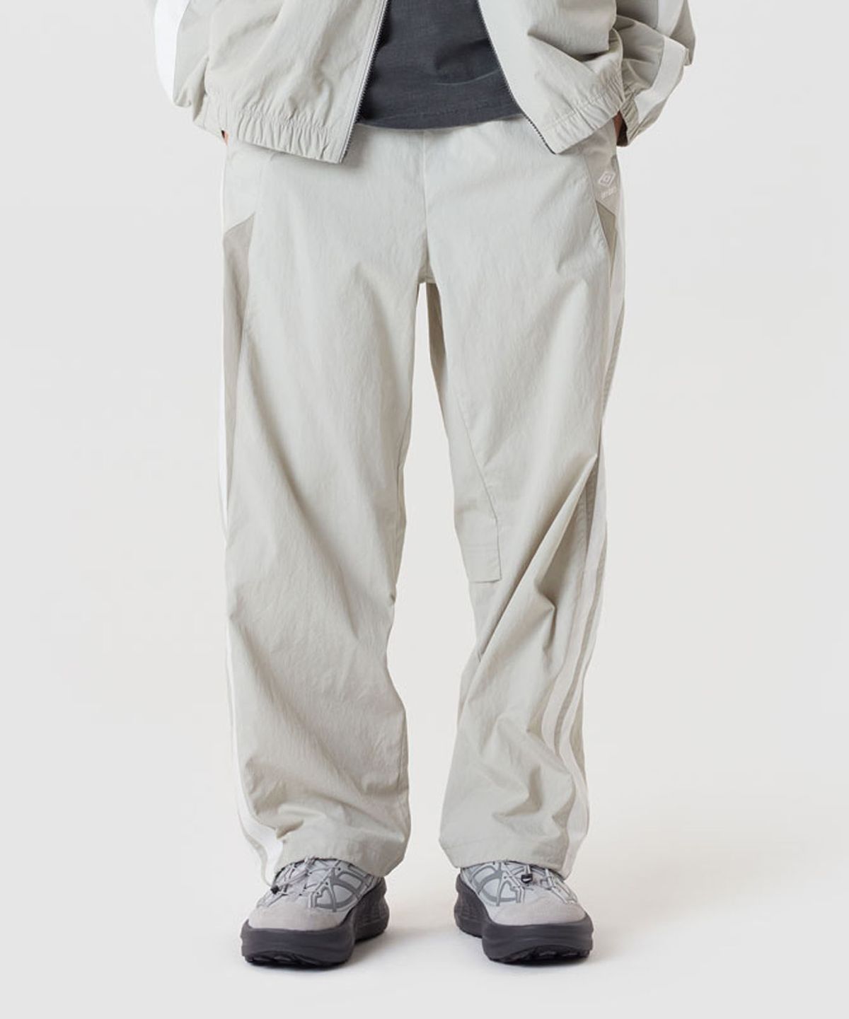 엄브로(UMBRO) 더블데커 스트레이트 & 조거 2WAY 팬츠 베이지(UQ121CPT13)
