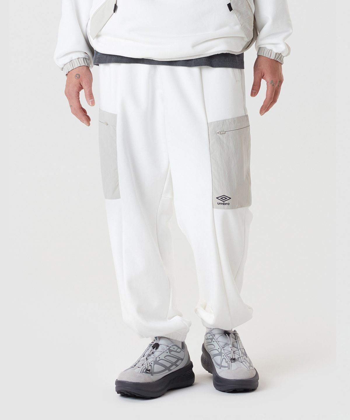 엄브로(UMBRO) 웨이파인더 우븐BIT 니트 조거 팬츠 아이보리(UQ121CFP13)
