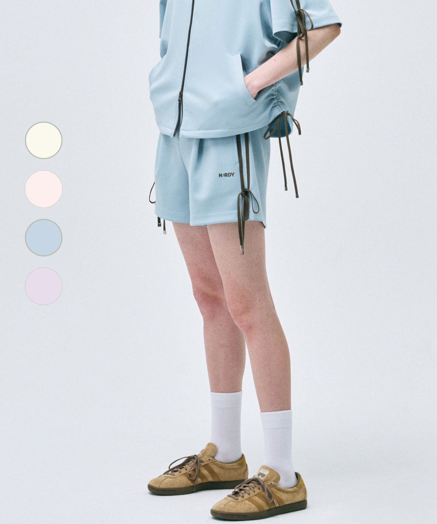 [ NERDY ]★25SS★韓国人気★WOMEN'S RIBBON TRACK SHORTS MUSINSA | NERDY Women's Ribbon Track Shorts (25SS) (Cream
