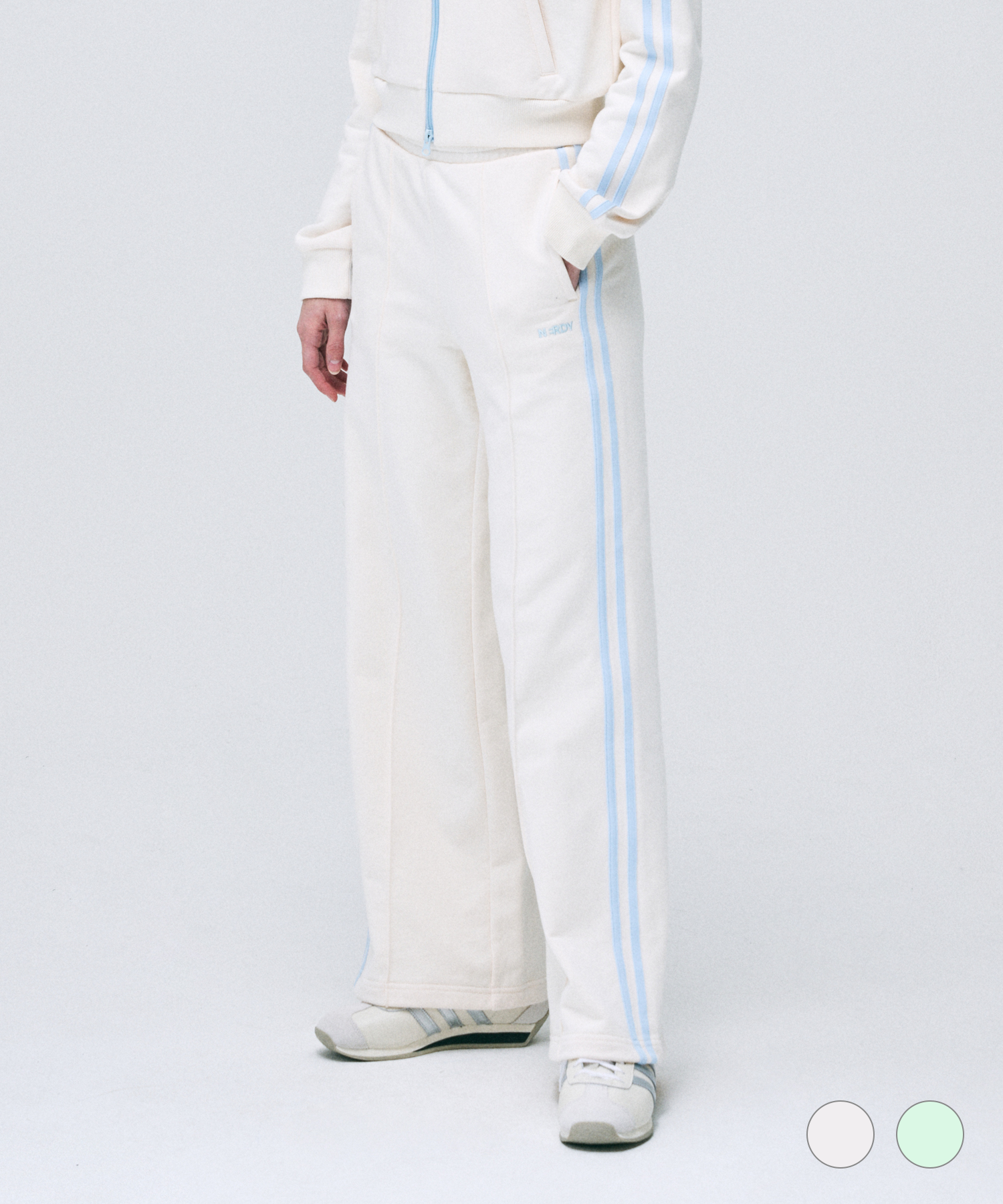 [ NERDY ]★25SS★韓国人気★WOMEN'S NY TRACK PANTS MUSINSA | NERDY Women's NY Track Pants (25SS) (Cream/Melon)