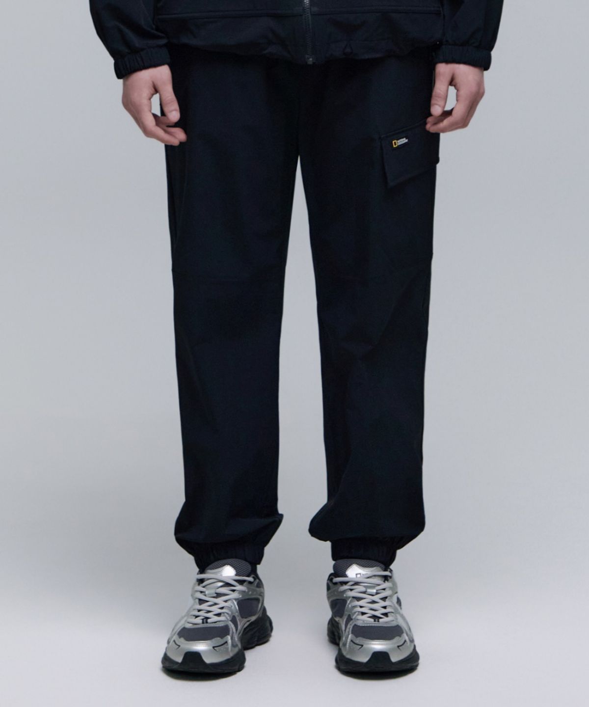 내셔널지오그래픽(NATIONALGEOGRAPHIC) N251UPT991 리오 우븐 스트레치 조거 팬츠 CARBON BLACK