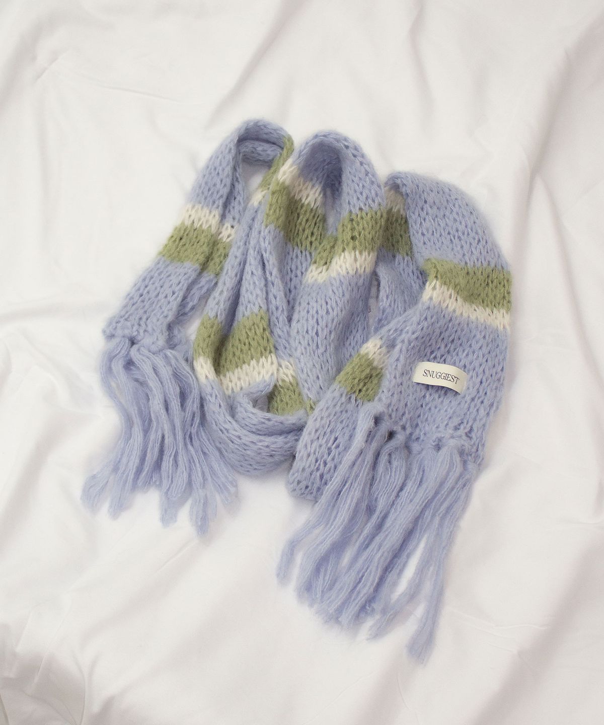 스너기스트(SNUGGIEST) 플러피 스트라이프 머플러_소프트블루