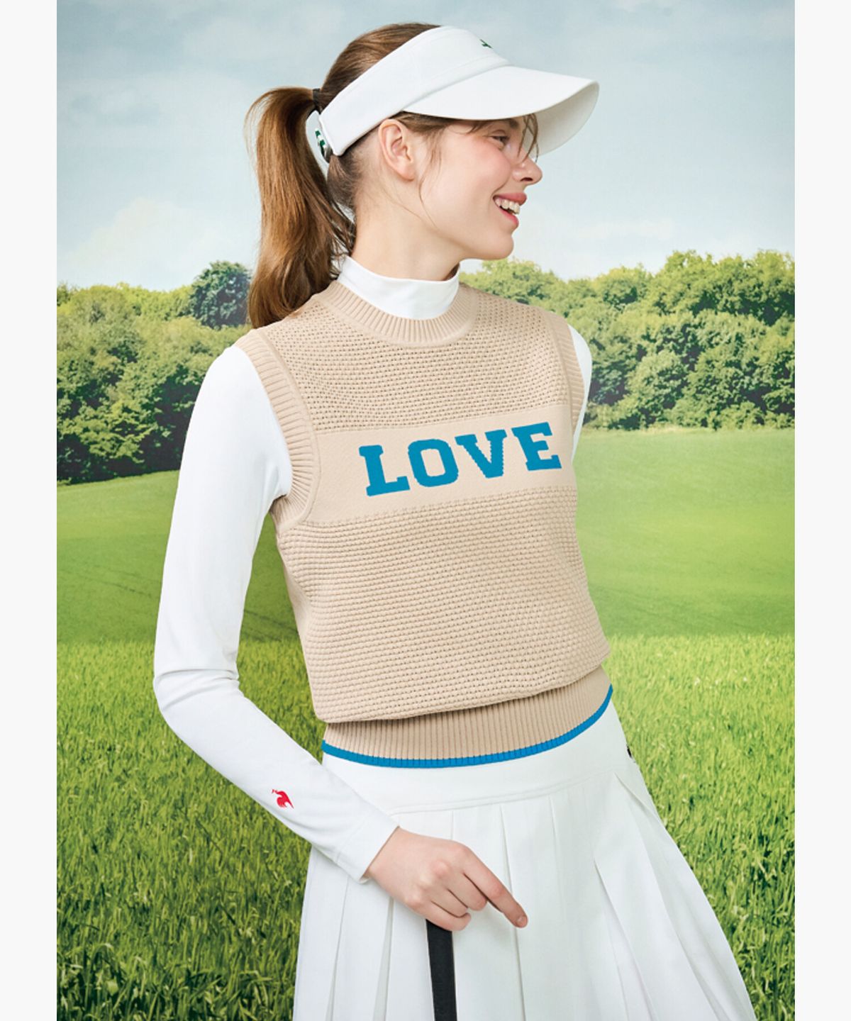 르꼬끄 골프(LECOQ GOLF) 여성 레터링 포인트 라운드넥 니트 베스트 (GQ122LKV21)