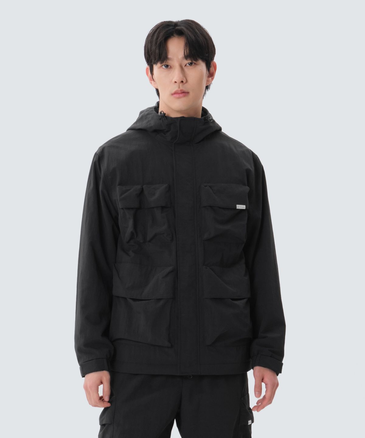 스노우피크 어패럴(SNOWPEAK APPAREL) 캠플 유틸리티 바람막이 (S25SMCWB10) Dark Charcoal