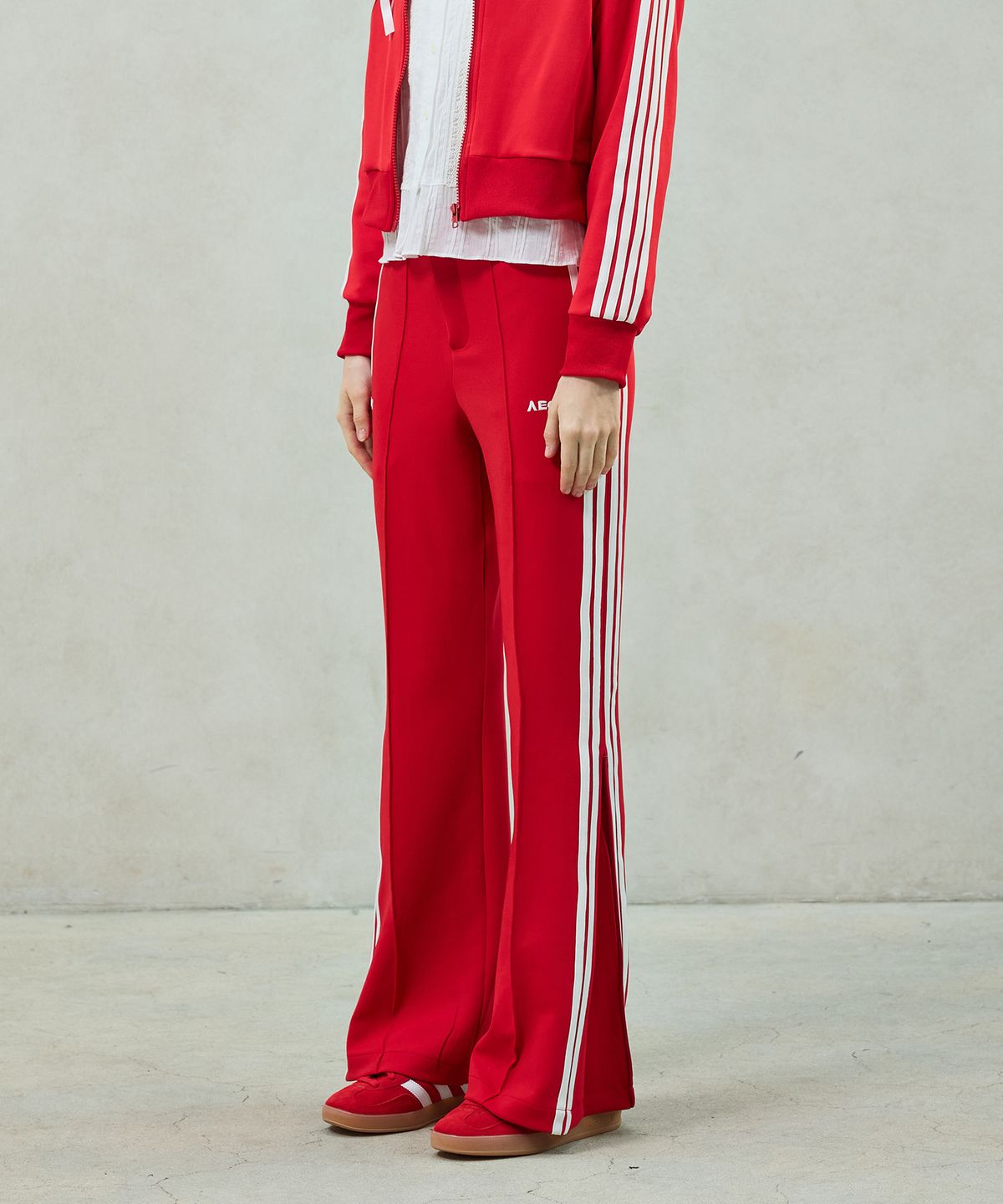 아리킴(ARIKIM) JOEL JERSEY TRACK PANTS / RED