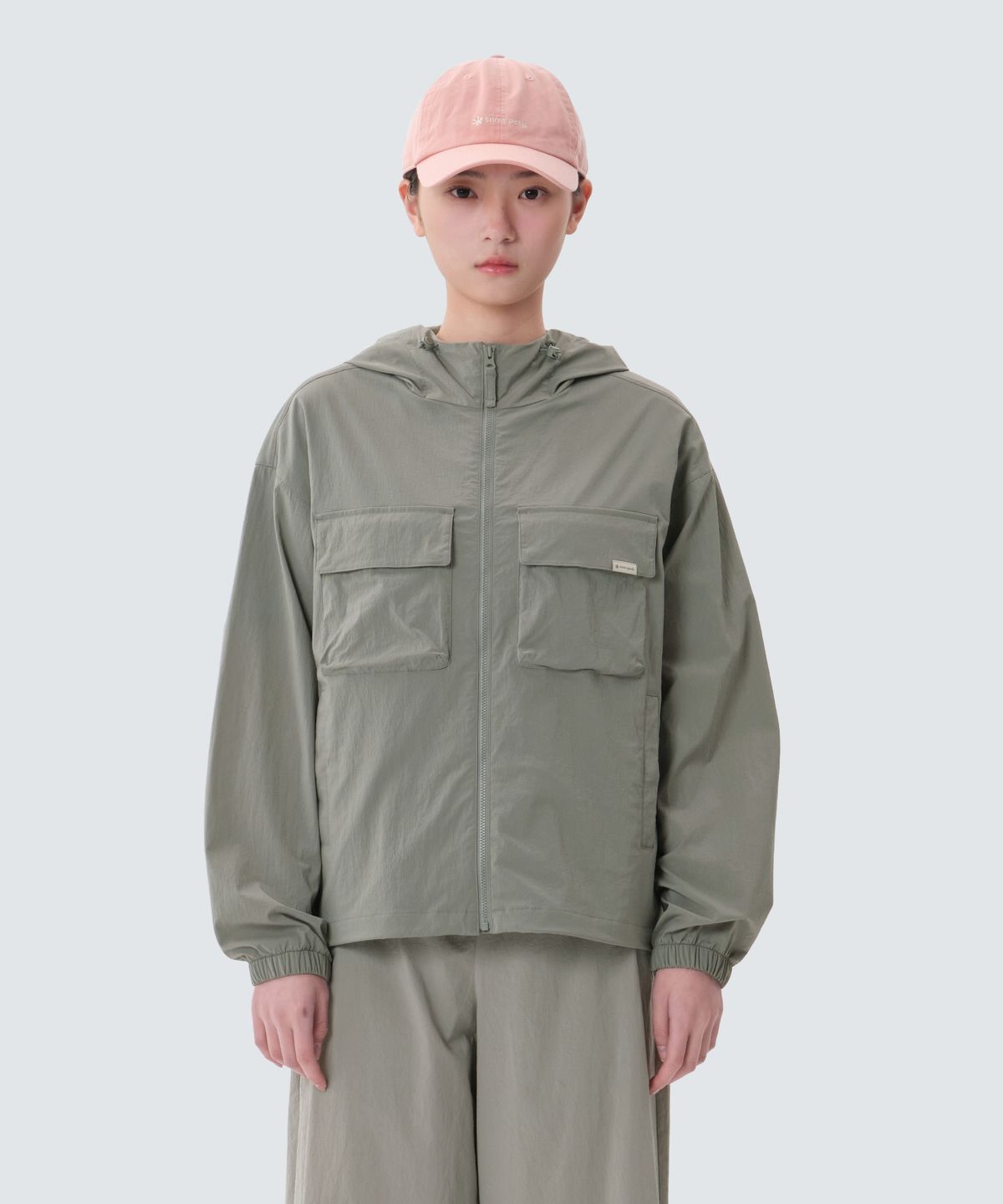 스노우피크 어패럴(SNOWPEAK APPAREL) 루트 여성 포켓 바람막이 (S25MWRWB61) Light Khaki