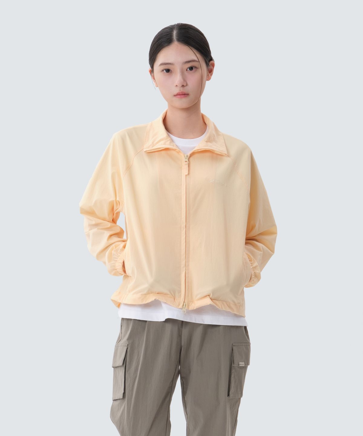 스노우피크 어패럴(SNOWPEAK APPAREL) 루트 여성 스탠드넥 바람막이 (S25MWRWB65) Light Yellow