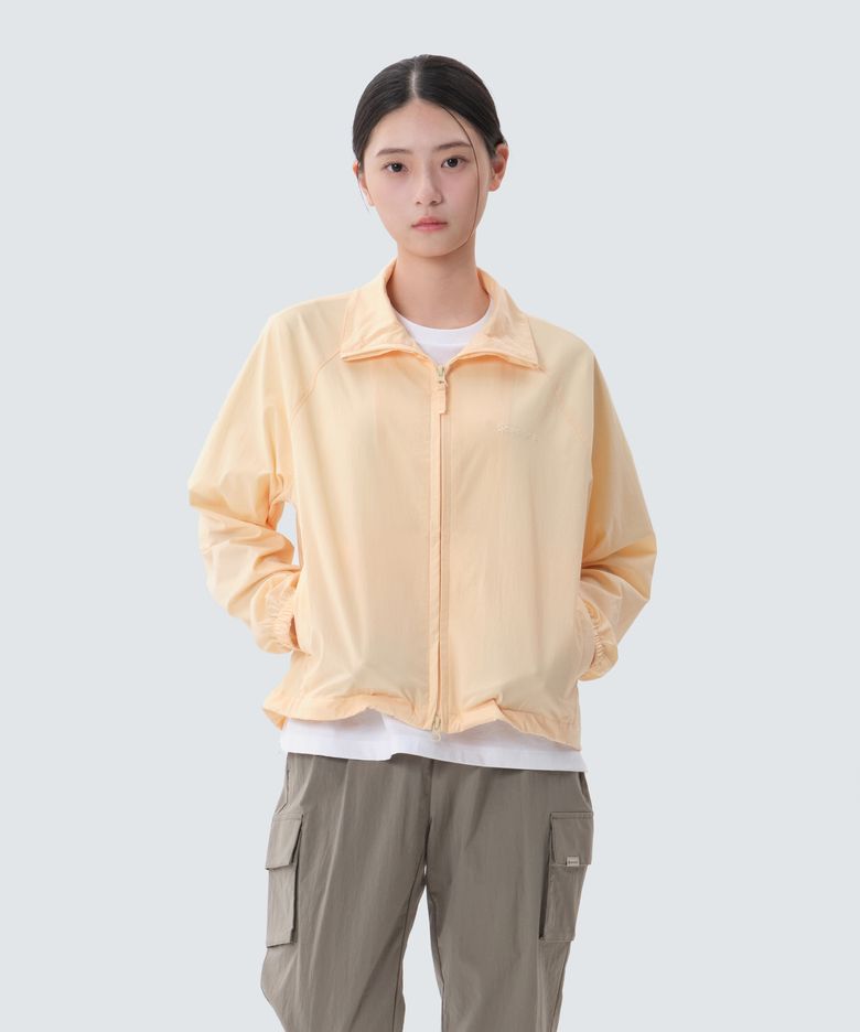 루트 여성 스탠드넥 바람막이 (S25MWRWB65) Light Yellow