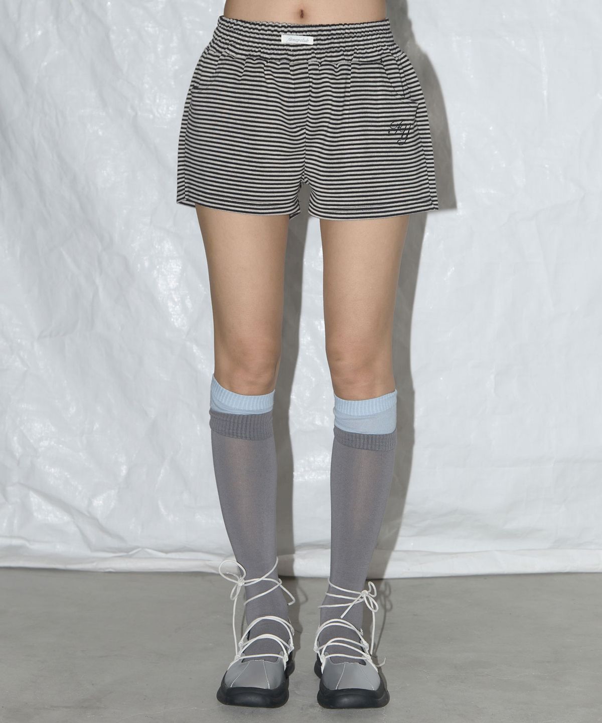 팬시클럽(FANCY CLUB) FY 스트라이프 마이크로 숏팬츠 (BLACK) F25QD898