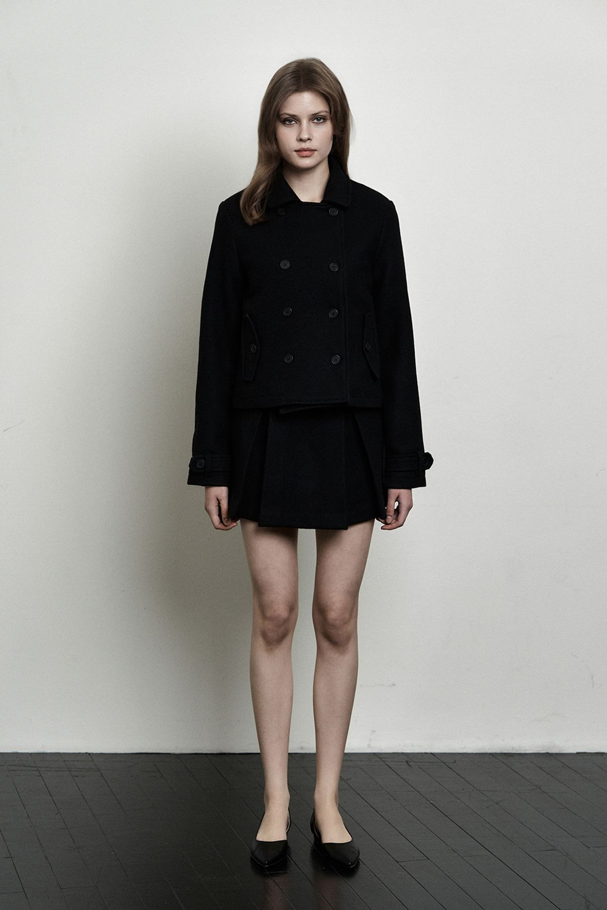 시너진(SYNERJYN) PLAIN WOOL MINI SKIRT BLACK