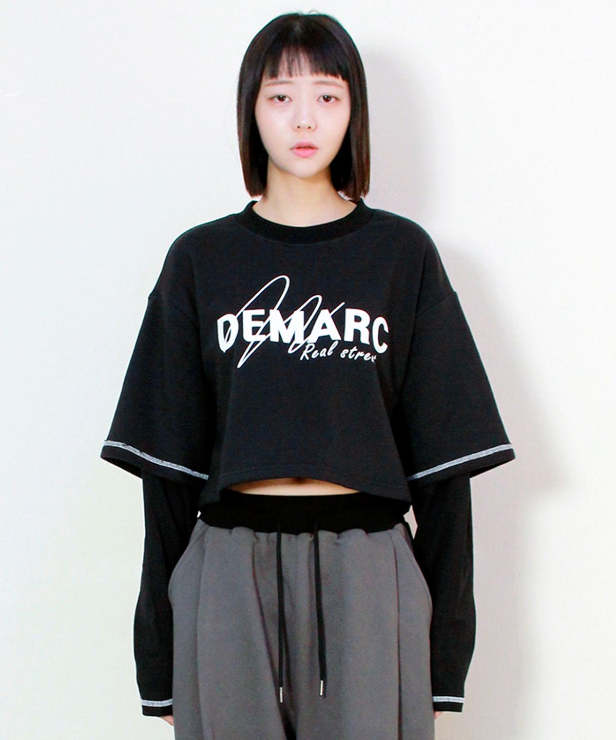 드마크(DEMARC) 더블 슬리브 크롭 티셔츠 블랙