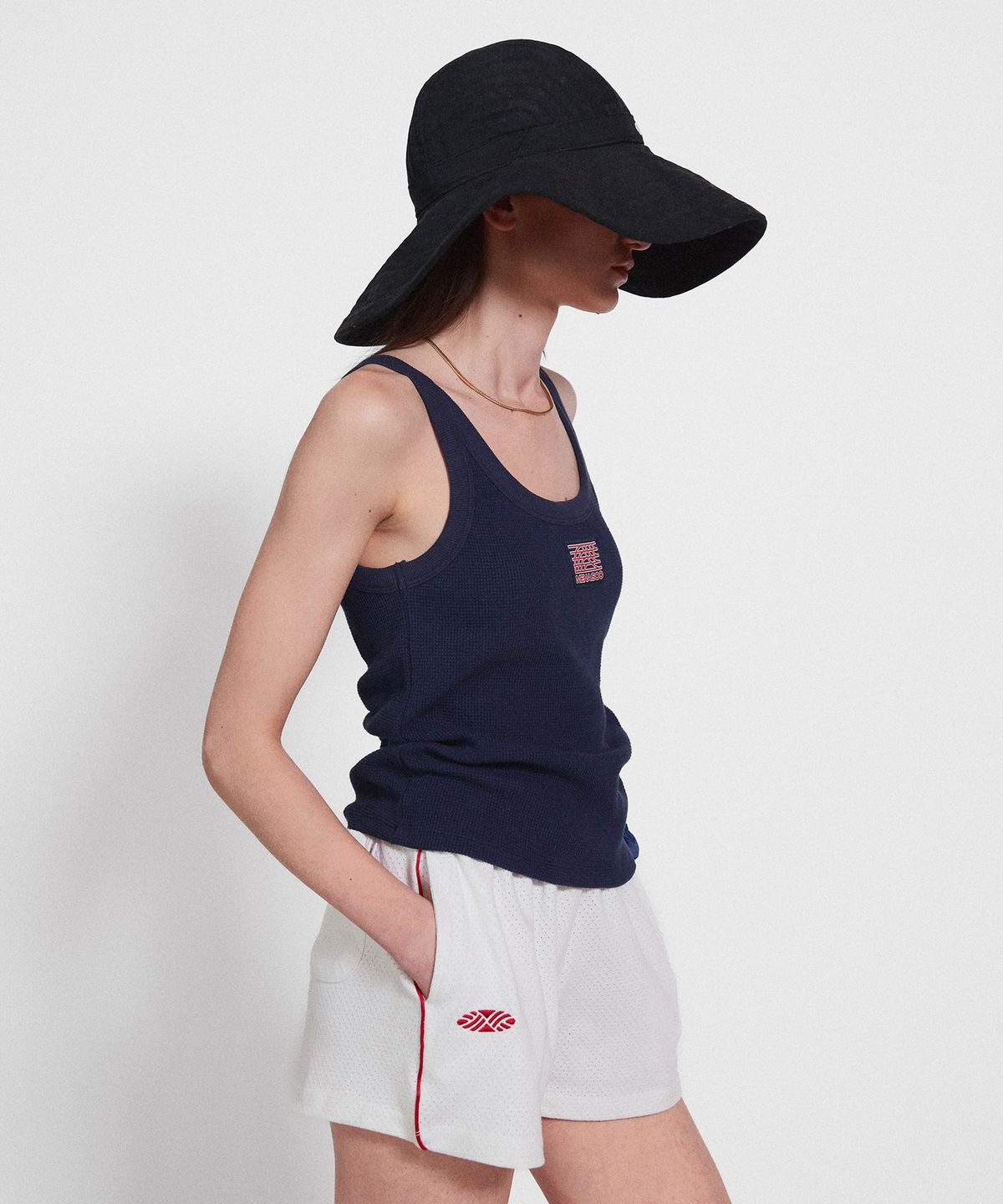 미나수(MENASOO) Track Logo Reversible Waffle Sleeveless_Navy