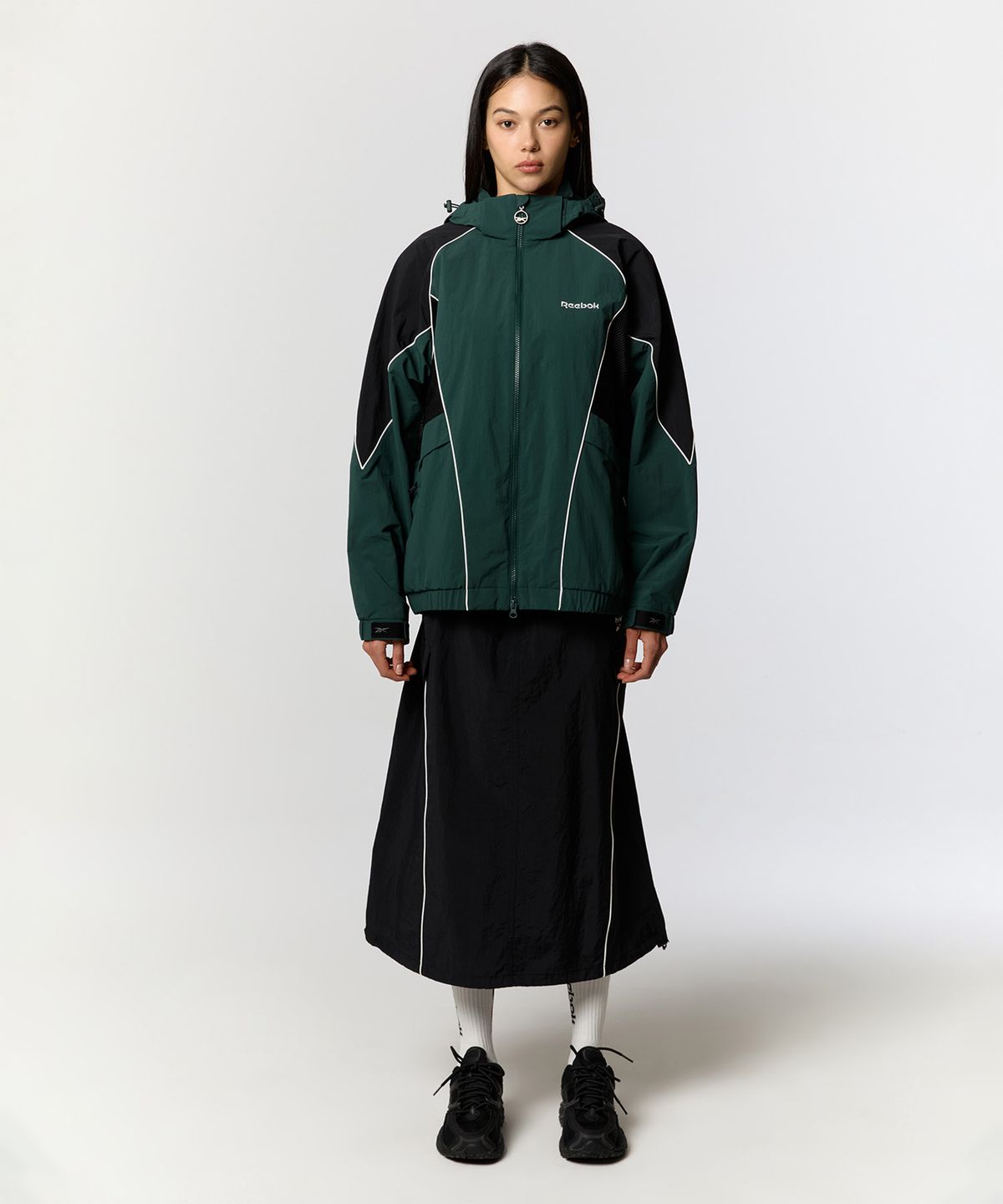 리복(REEBOK) 파이핑 우븐 스커트 (W) - 블랙