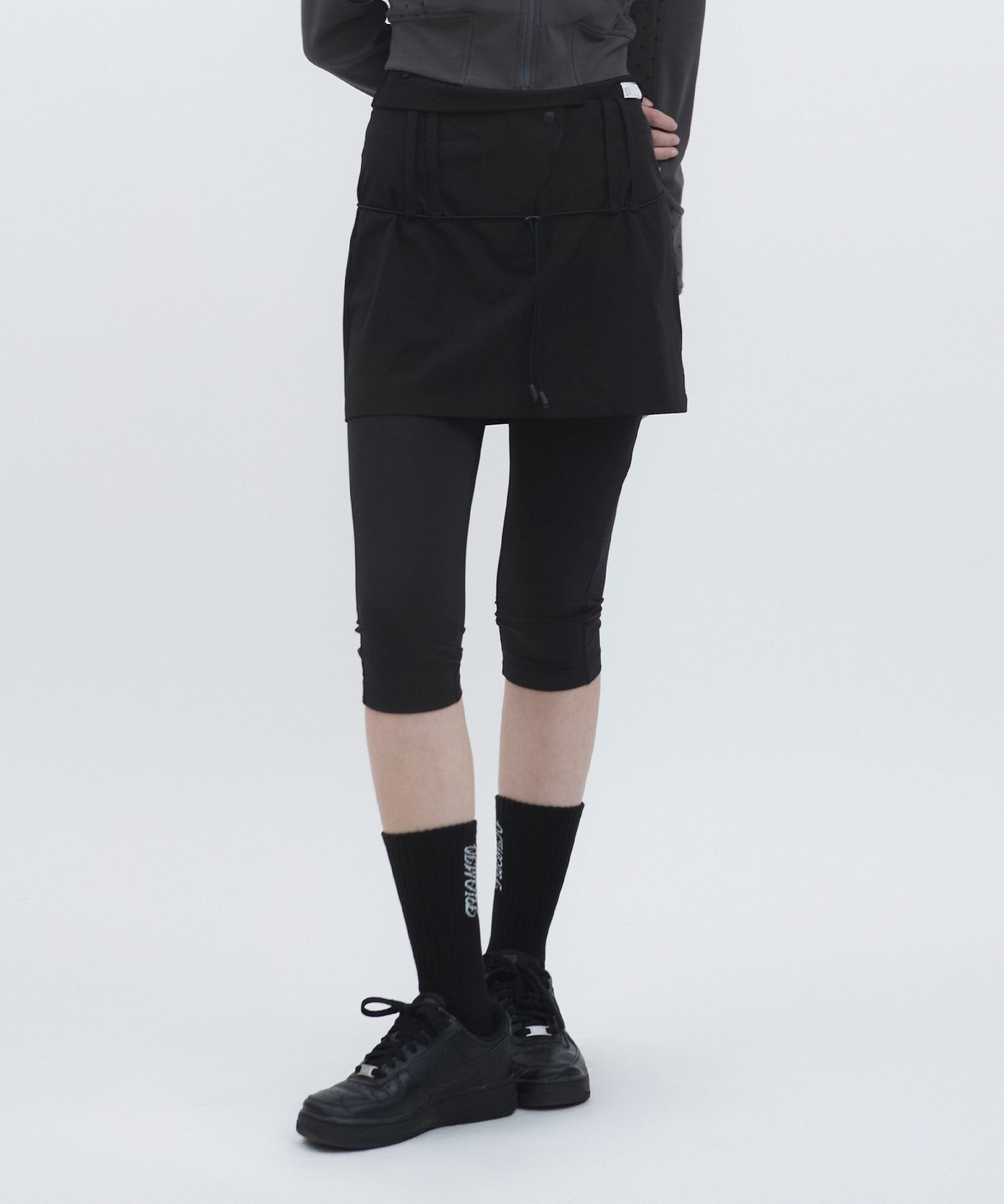 MUSINSA | TUOMIO STRING BELTED SKIRT PANTS [BLACK]
