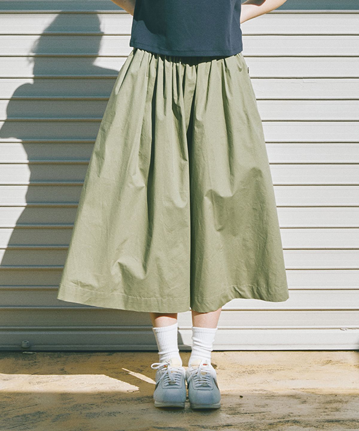 컬럼비아 유니버시티(COLUMBIA UNIVERSITY) ALL-ROUND PLEATS COTTON LONG SKIRTS 카키