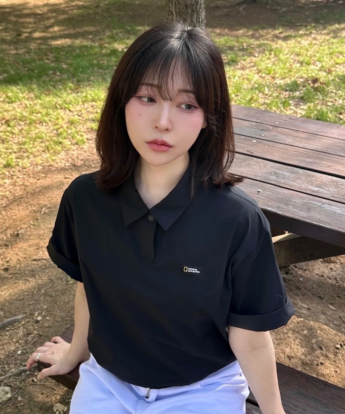 내셔널지오그래픽(NATIONALGEOGRAPHIC) N252WTS141 여성 아델리 경량 우븐 스트레치 카라형 티셔츠 CARBON BLACK