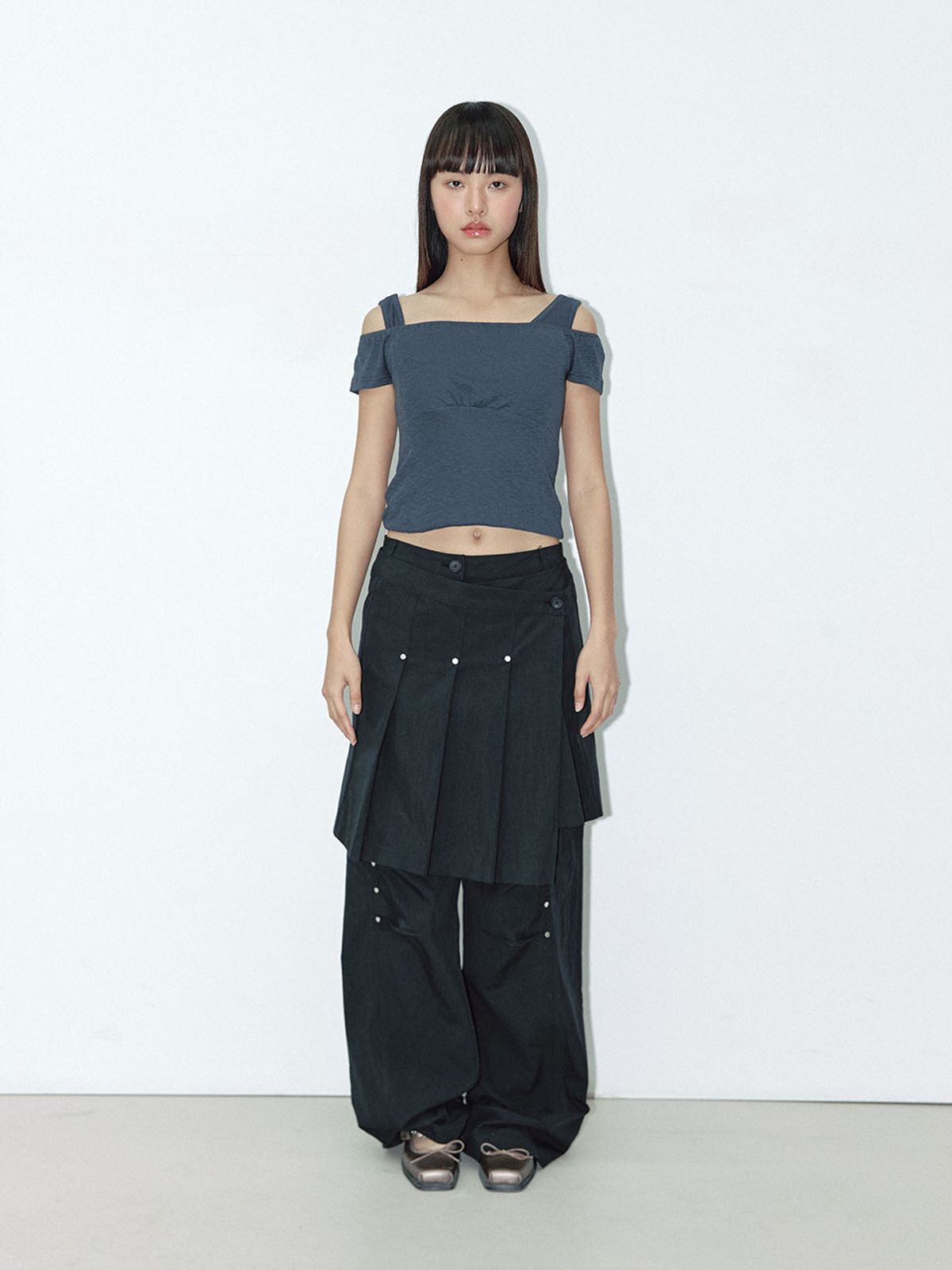 아수라(ASURA) ATYPICAL RIVET PLEATS SKIRT (BLACK)