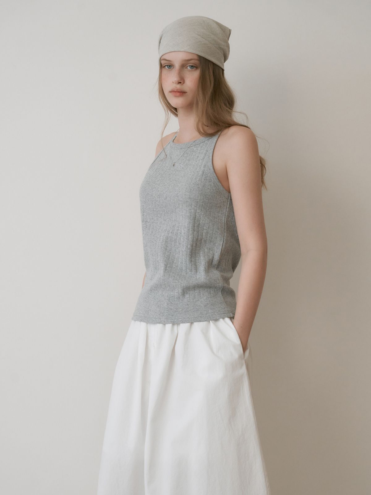 더미튼(THEMITTEN) Milk tea sleeveless (gray)