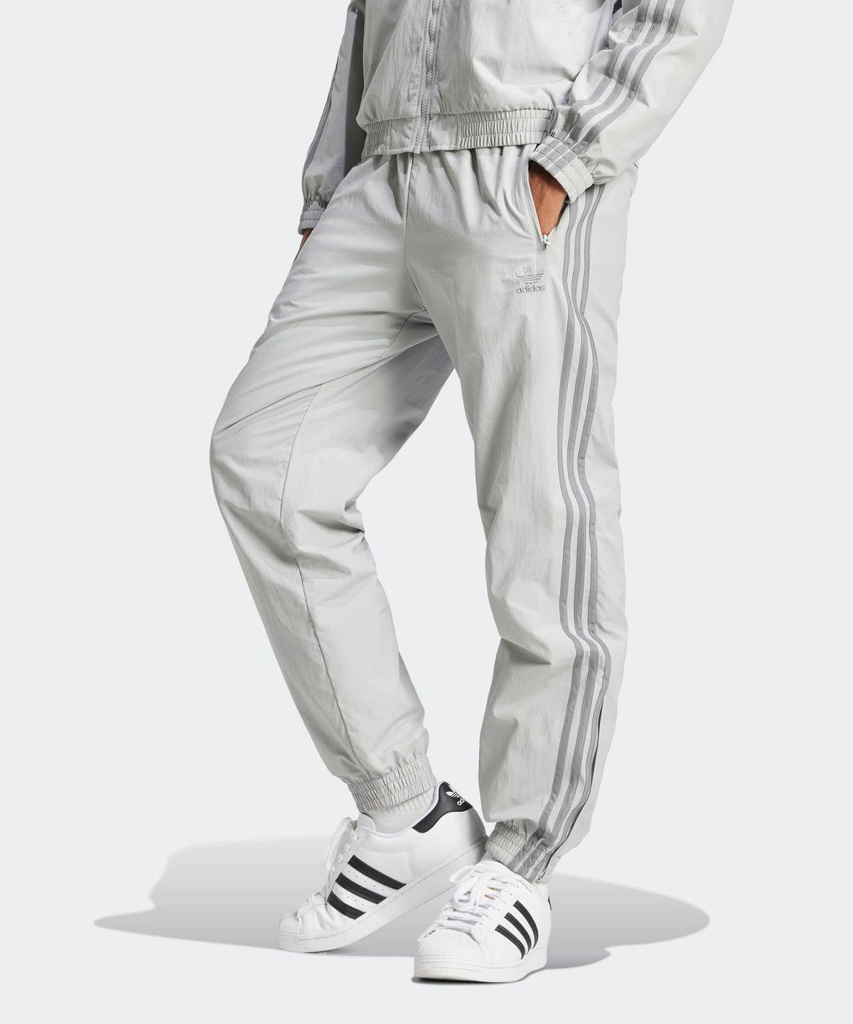 아디다스(ADIDAS) 우븐 파이어버드 트랙 팬츠 - 그레이 / JD0425