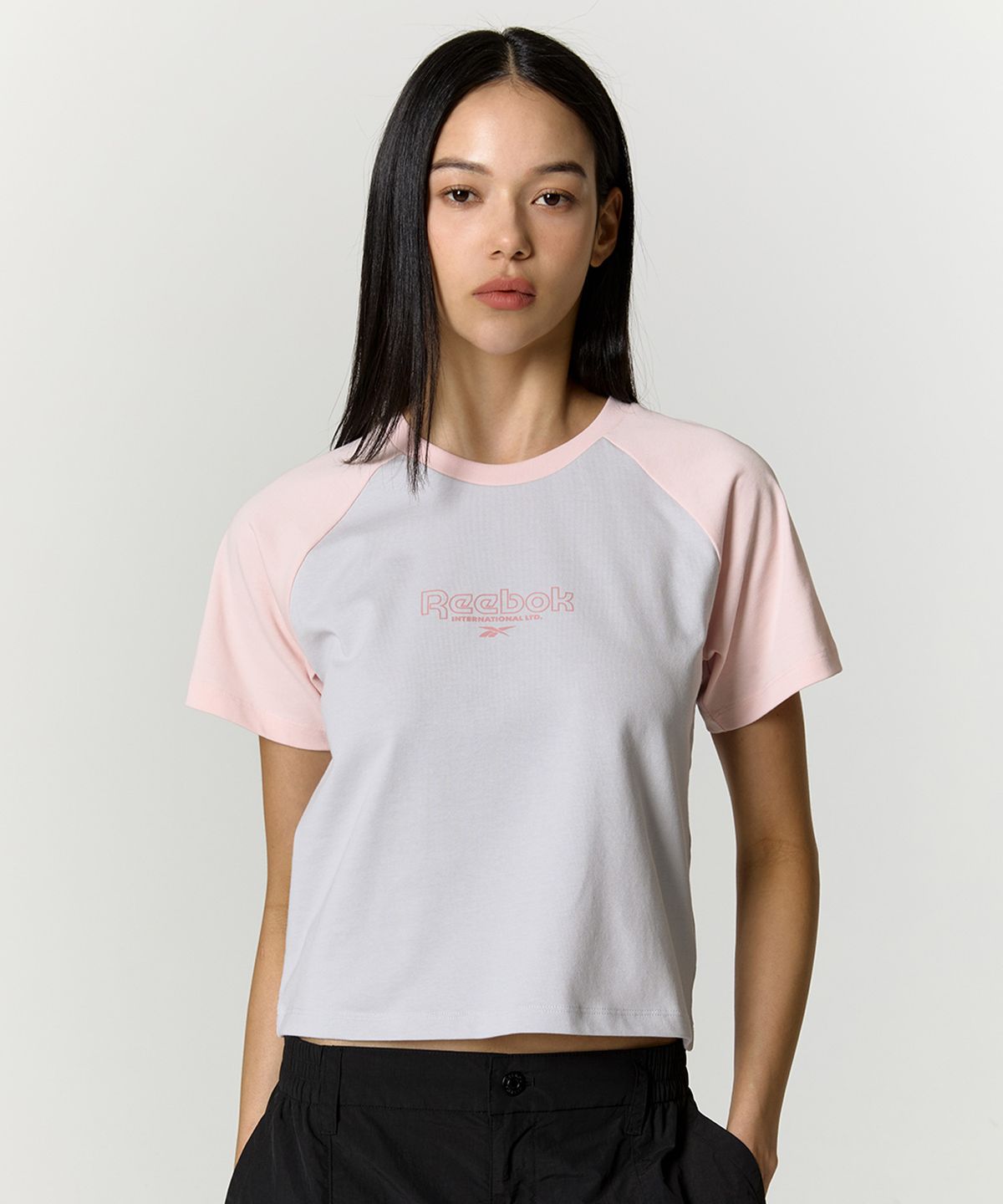 리복(REEBOK) 프린트 래글런 티셔츠 (W) - 핑크