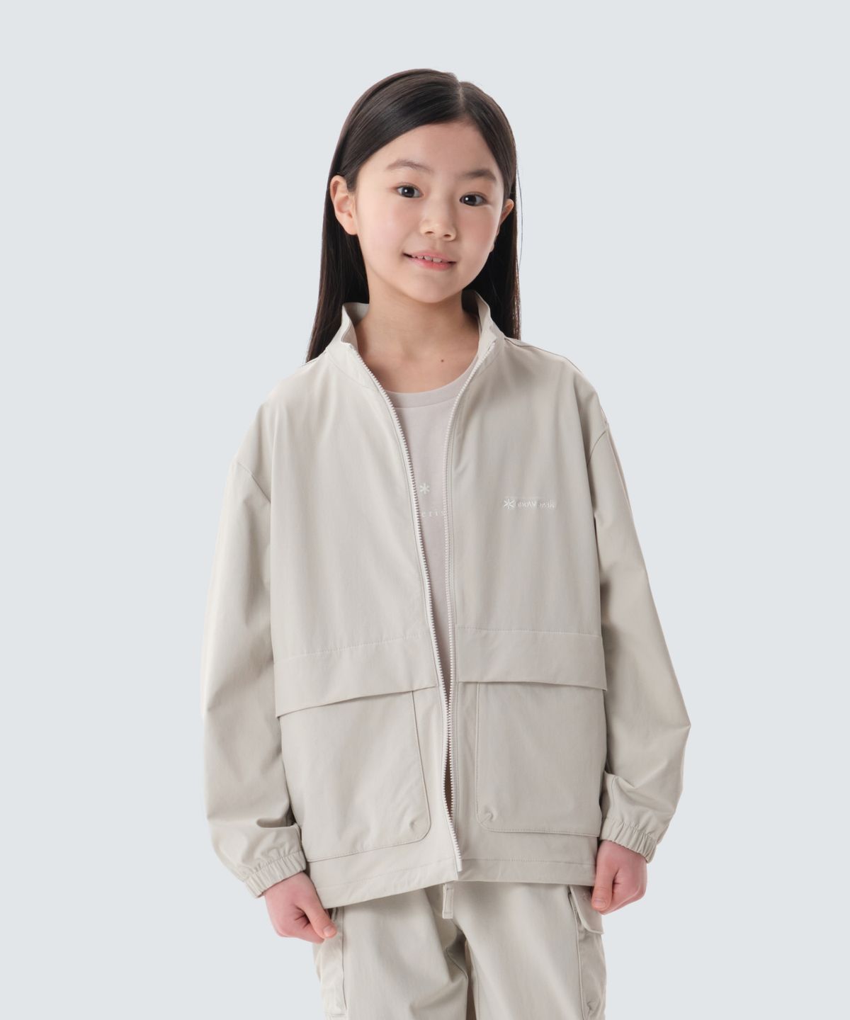 스노우피크 어패럴 키즈(SNOWPEAK APPAREL KIDS) 키즈 라고 에어 스탠드넥 바람막이 (S25SKTWB80) Light Beige
