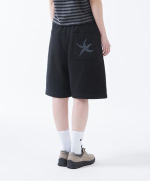 TCM back logo half sweat pants (black)