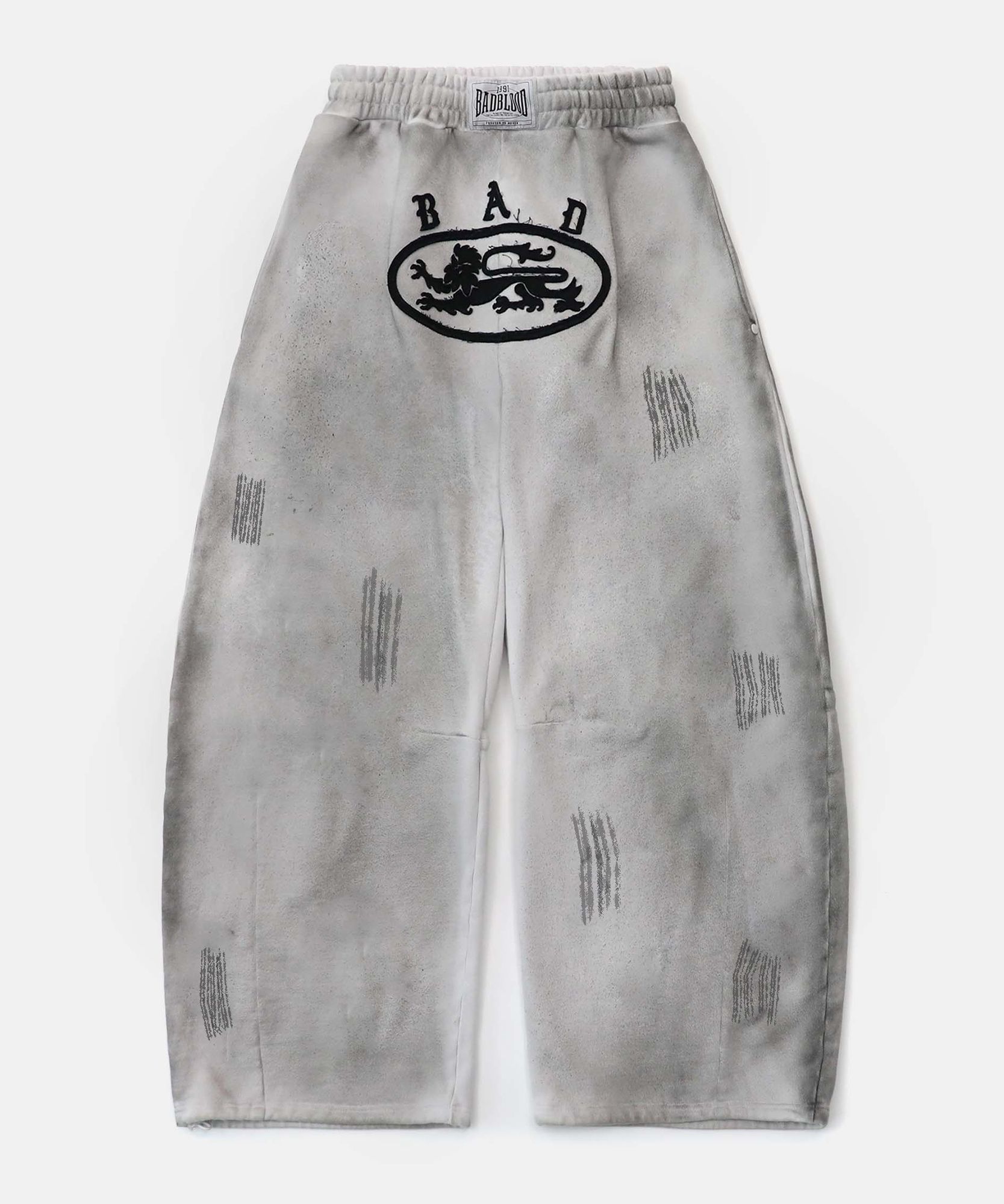MUSINSA | BADBLOOD Lion Patch 2 Way Curved Jogger - Washed White