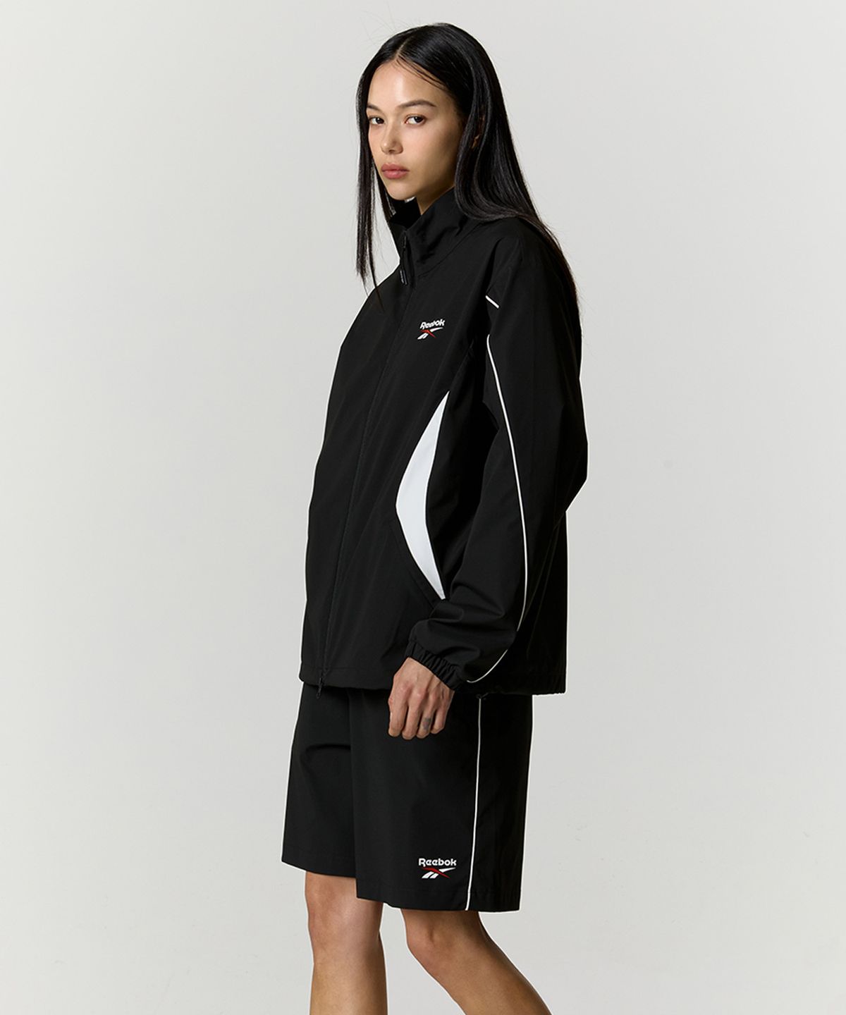 리복(REEBOK) 리바이벌 스트레치 쇼츠 - 블랙