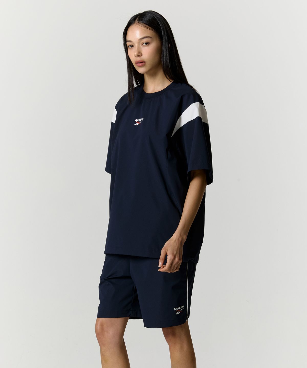 리복(REEBOK) 리바이벌 스트레치 쇼츠 - 네이비