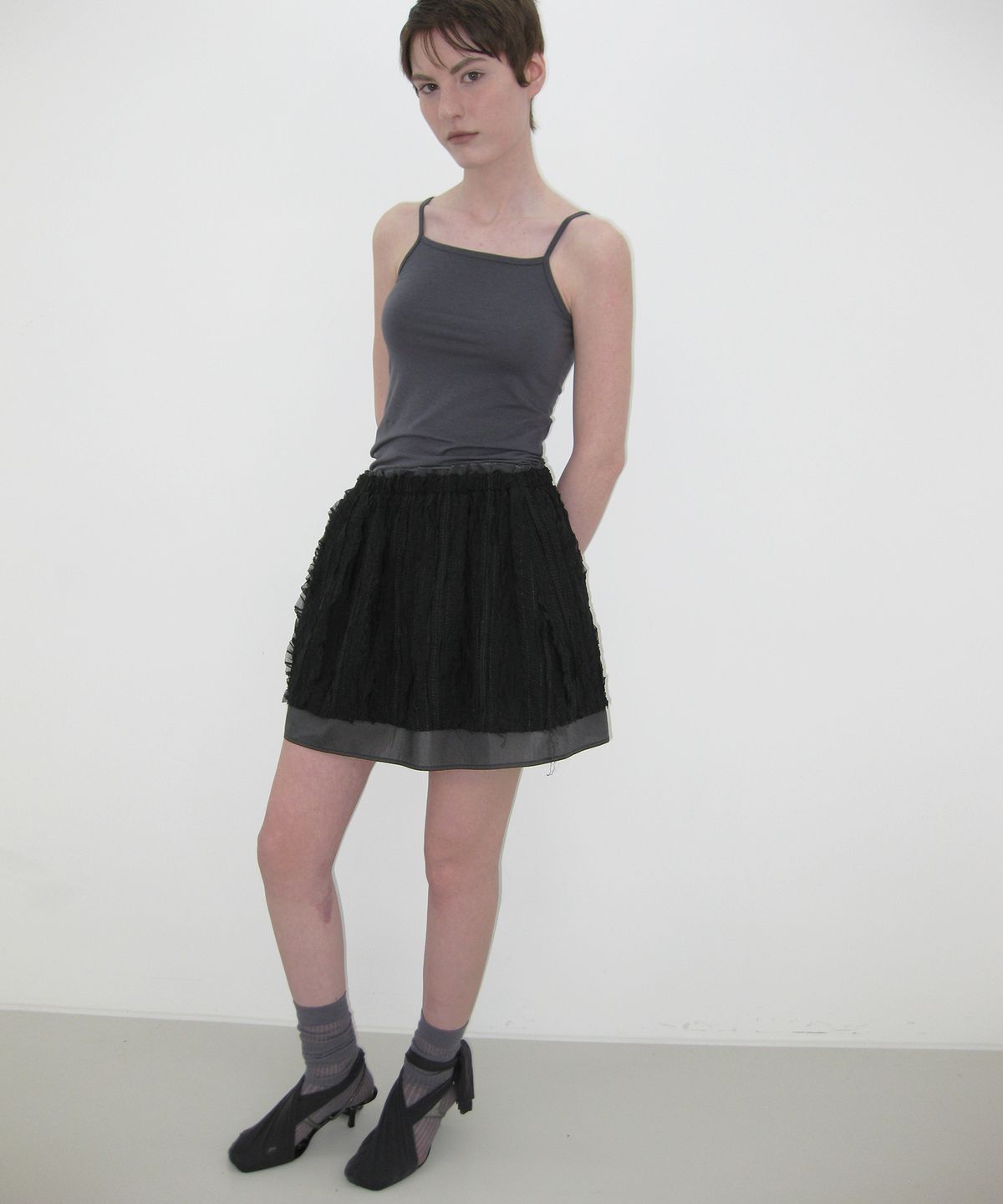 카셀(CACELE) RIPPLE LAYERED SKIRTS, BLACK
