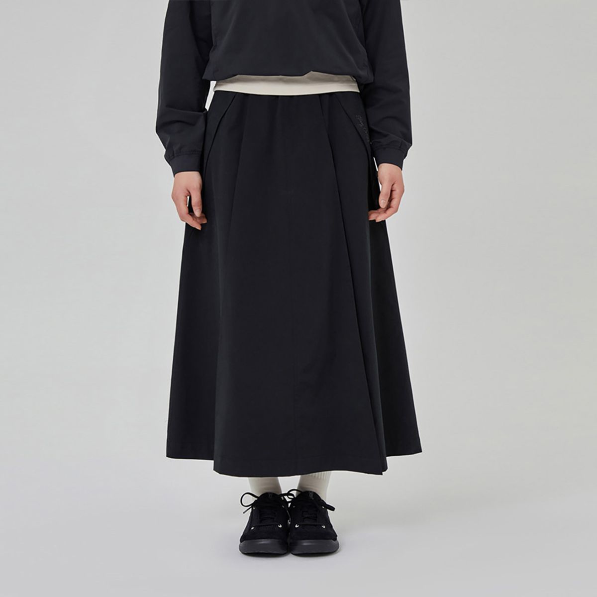 디오디(DOD) 워크 A라인 롱 스커트 여자(BLACK)