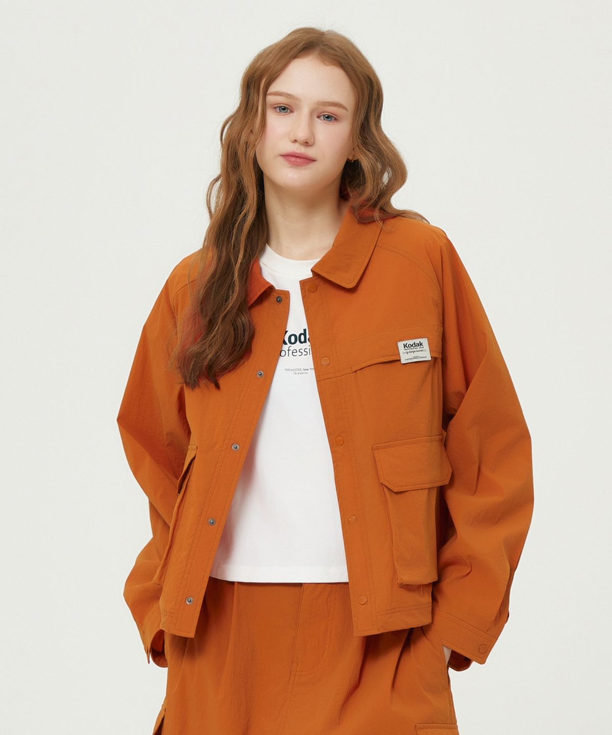 코닥(KODAK) 메일러 에센셜 긴팔 셔켓 우먼 ORANGE