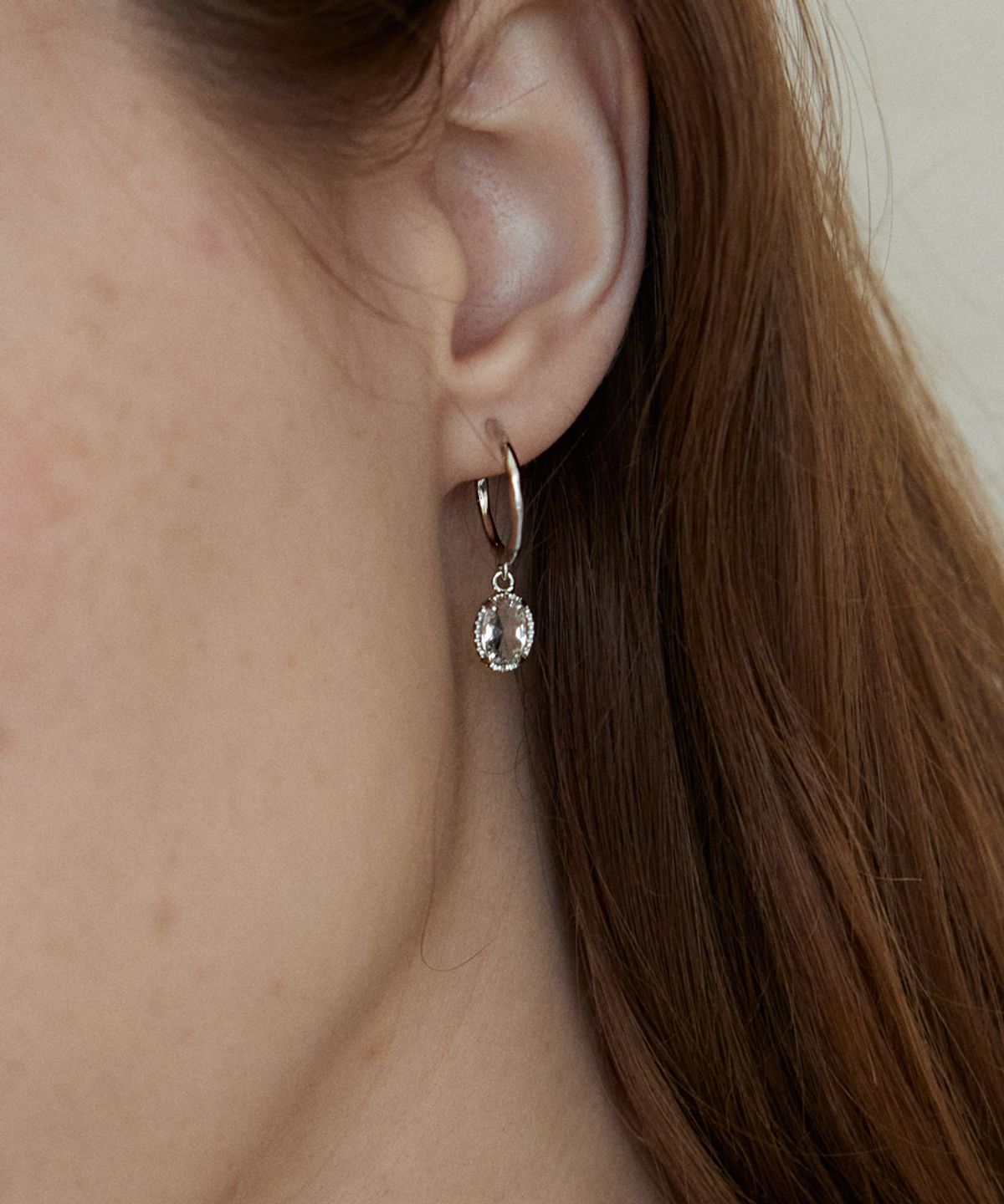 메리모티브(MERRYMOTIVE) Oval crystal drop earring