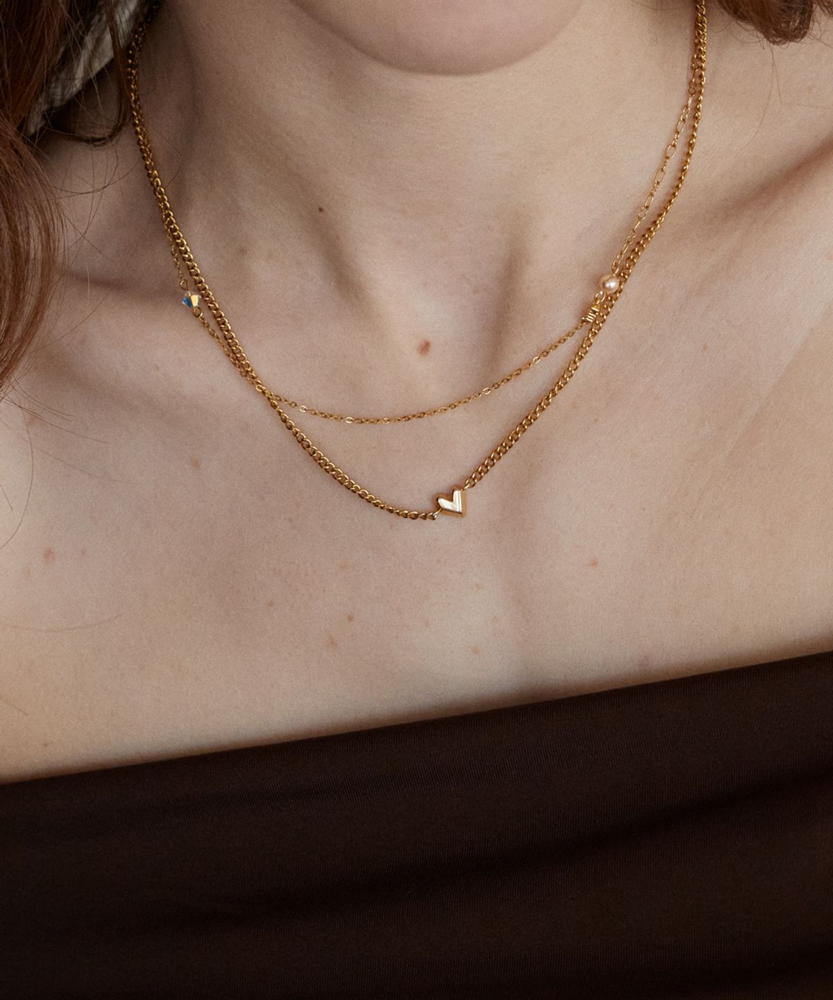 메리모티브(MERRYMOTIVE) Unique heart mix chain layered gold necklace