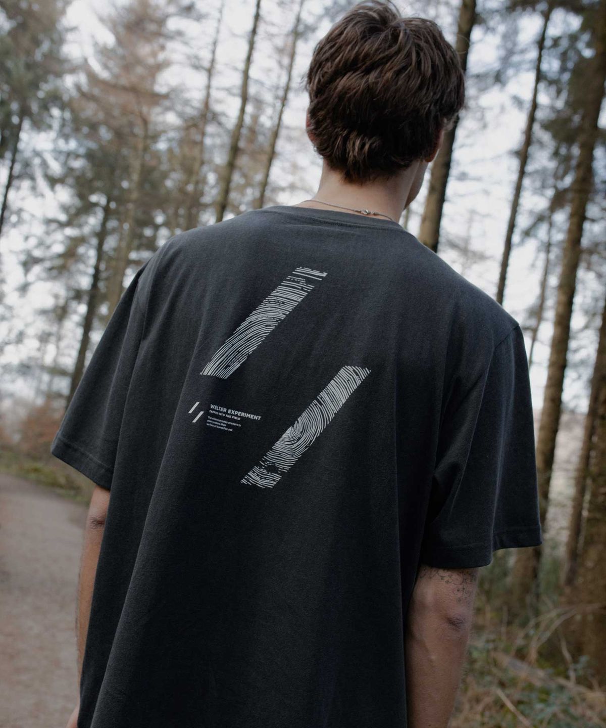 웰터 익스페리먼트(WELTER EXPERIMENT) TREE RING T-SHIRT_CHARCOAL