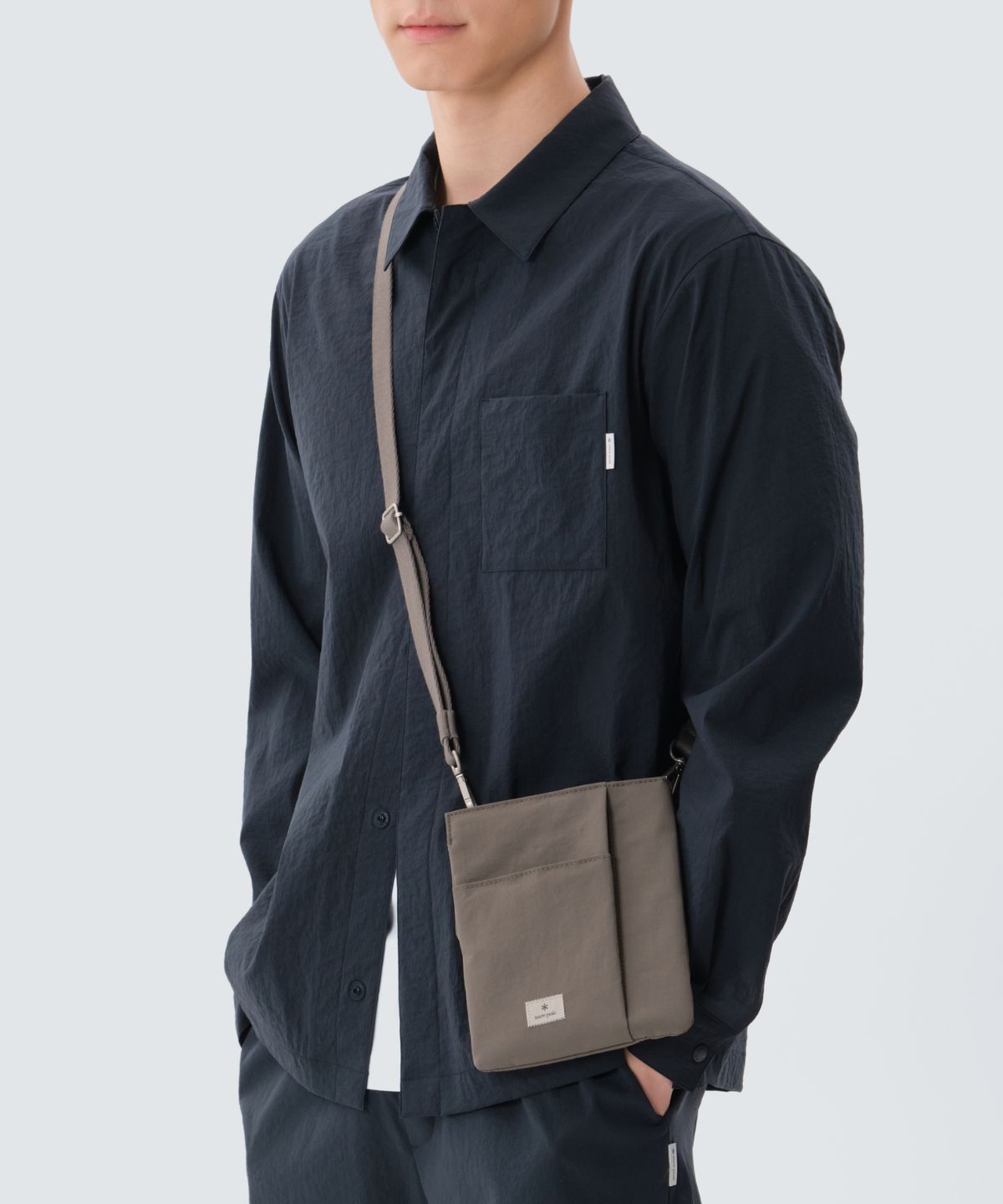 스노우피크 어패럴(SNOWPEAK APPAREL) 캠플 크로스 사코슈 (S25ZUCCB13) Dark Khaki