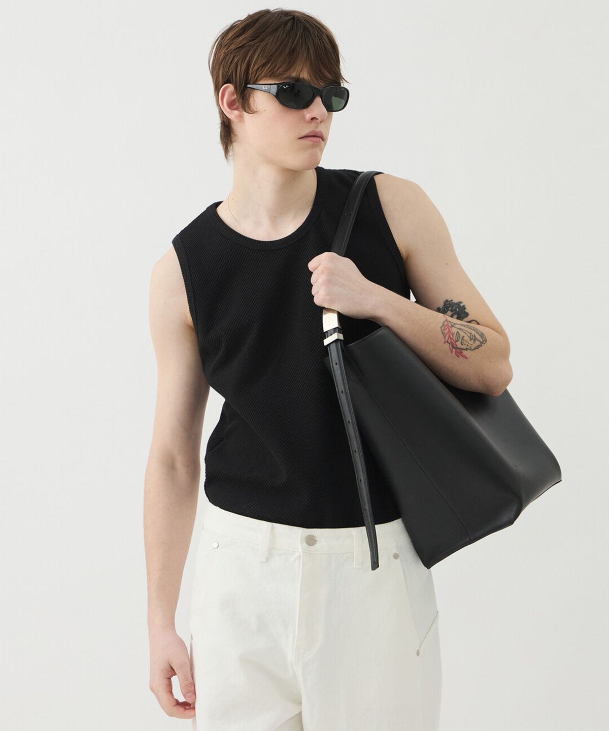 윈더(WINDER) SLANT RIB SLEEVELESS TOP - BLACK