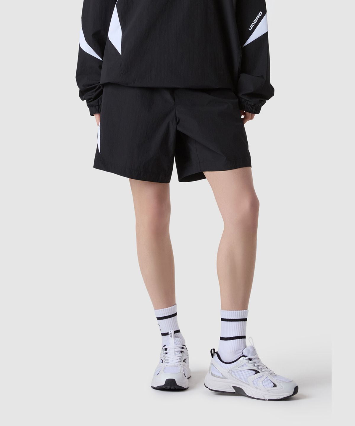 엄브로(UMBRO) 더블컷 4부 반바지 블랙(UQ223SHP53)