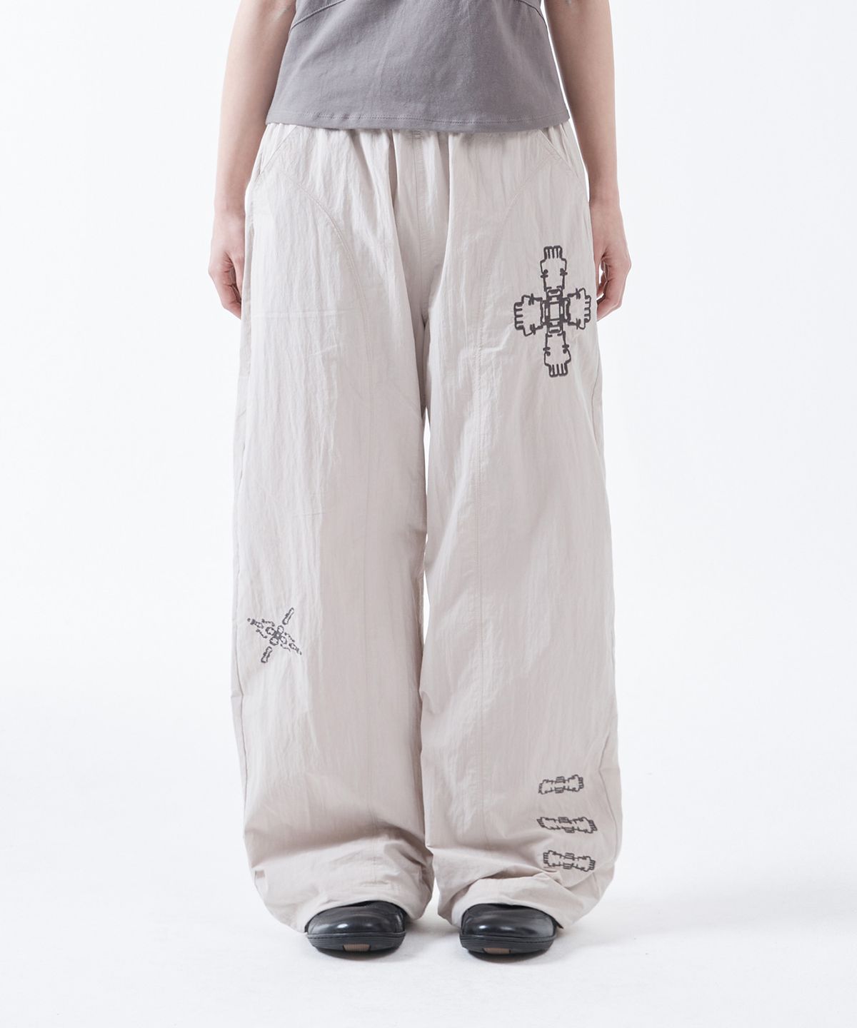 더콜디스트모먼트(THE COLDEST MOMENT) TCM ethnic nylon pants (ivory)